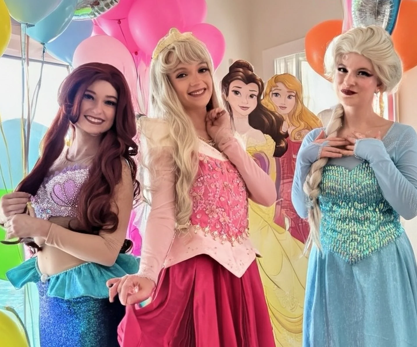 The Little Mermaid, Sleeping Beauty and Elsa from Frozen entertaining children at a Princess Birthday Party in Tampa.
