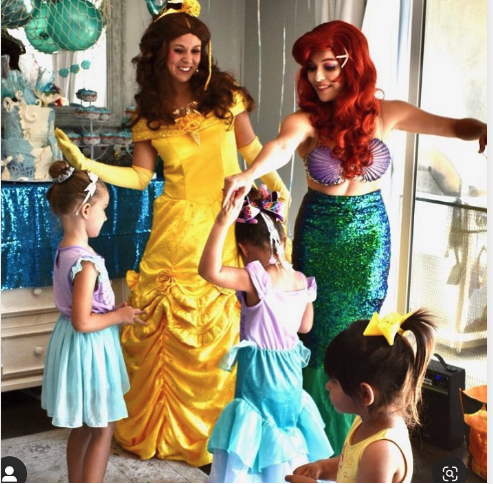 Belle and Little Mermaid dancing and singing with little kids at a birthday party in Los Angeles