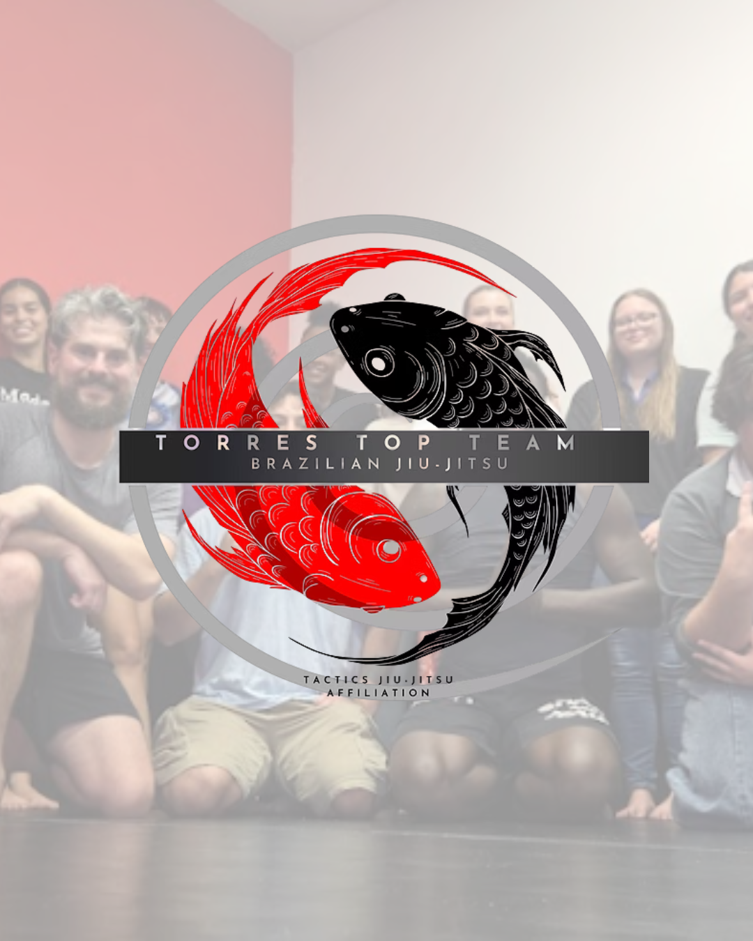 Group photo of people with a logo overlay promoting Torres Top Team Brazilian Jiu-Jitsu, featuring two stylized koi fish, one red and one black, forming a yin-yang shape.