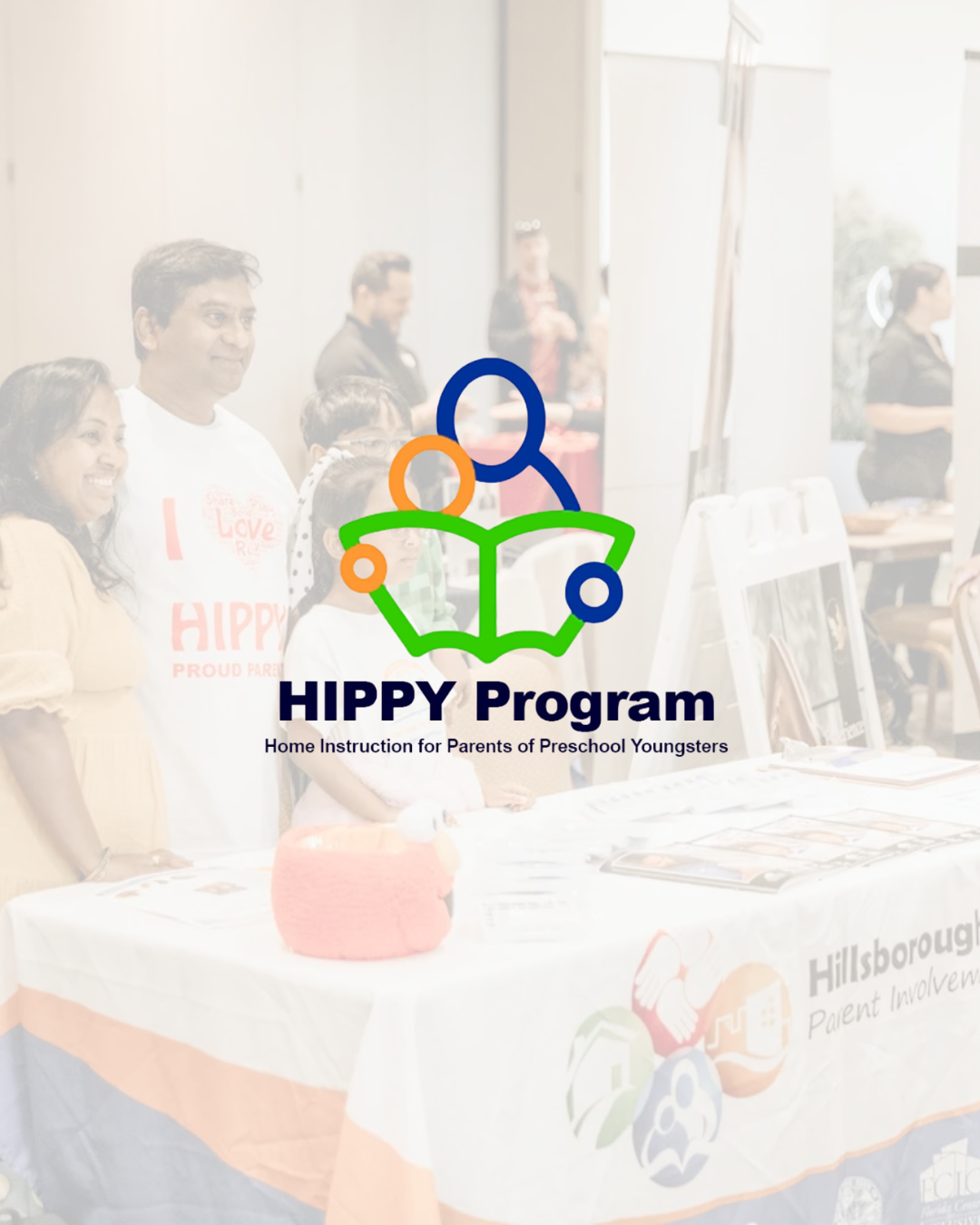 Group of parents and young children at a HIPPY Program event, with a logo and text overlay reading 'HIPPY Program Home Instruction for Parents of Preschool Youngsters'.