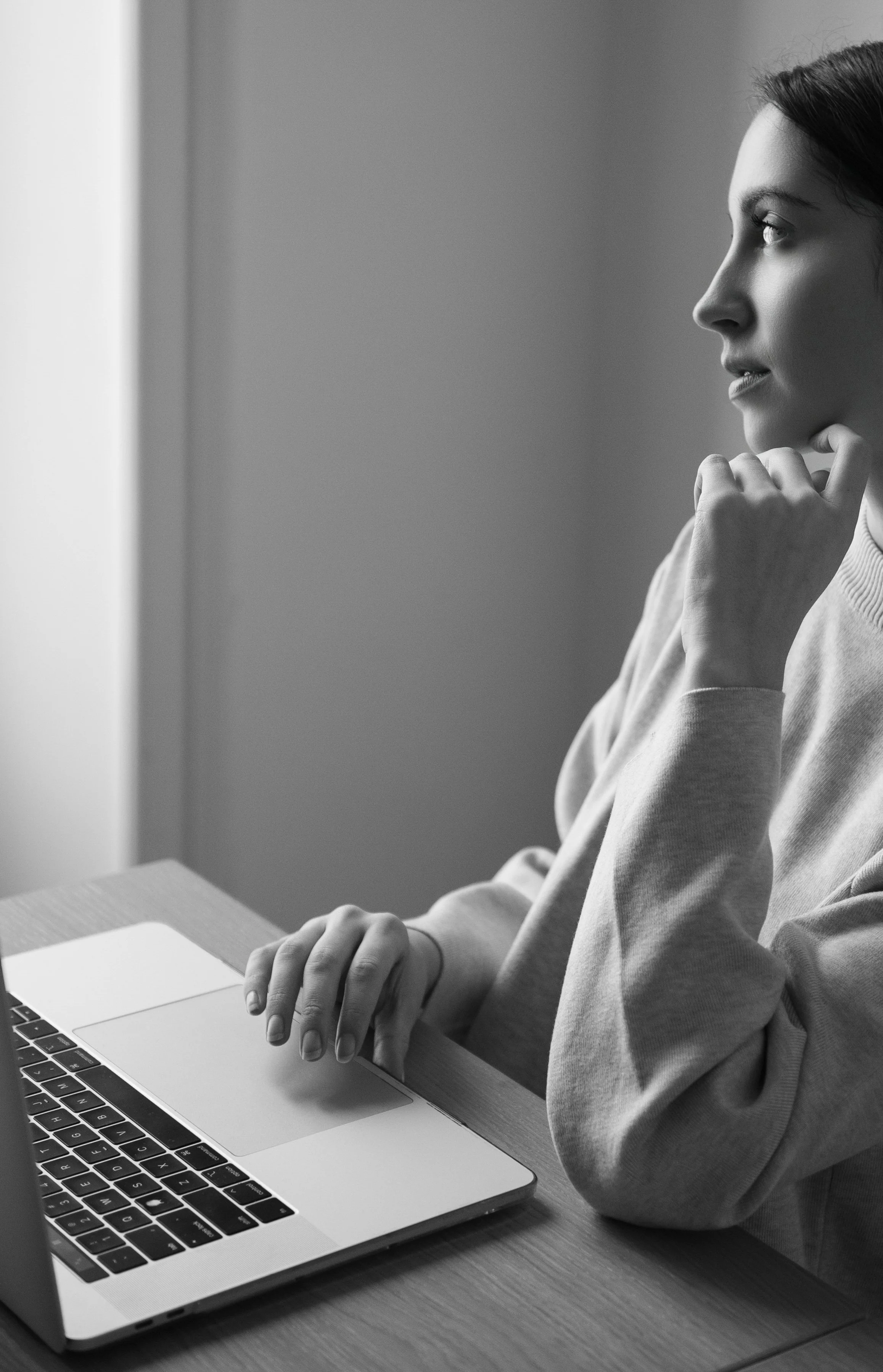 tenny admin and creative co - operations assistant - women working on laptop - black and white photo - Los Angeles