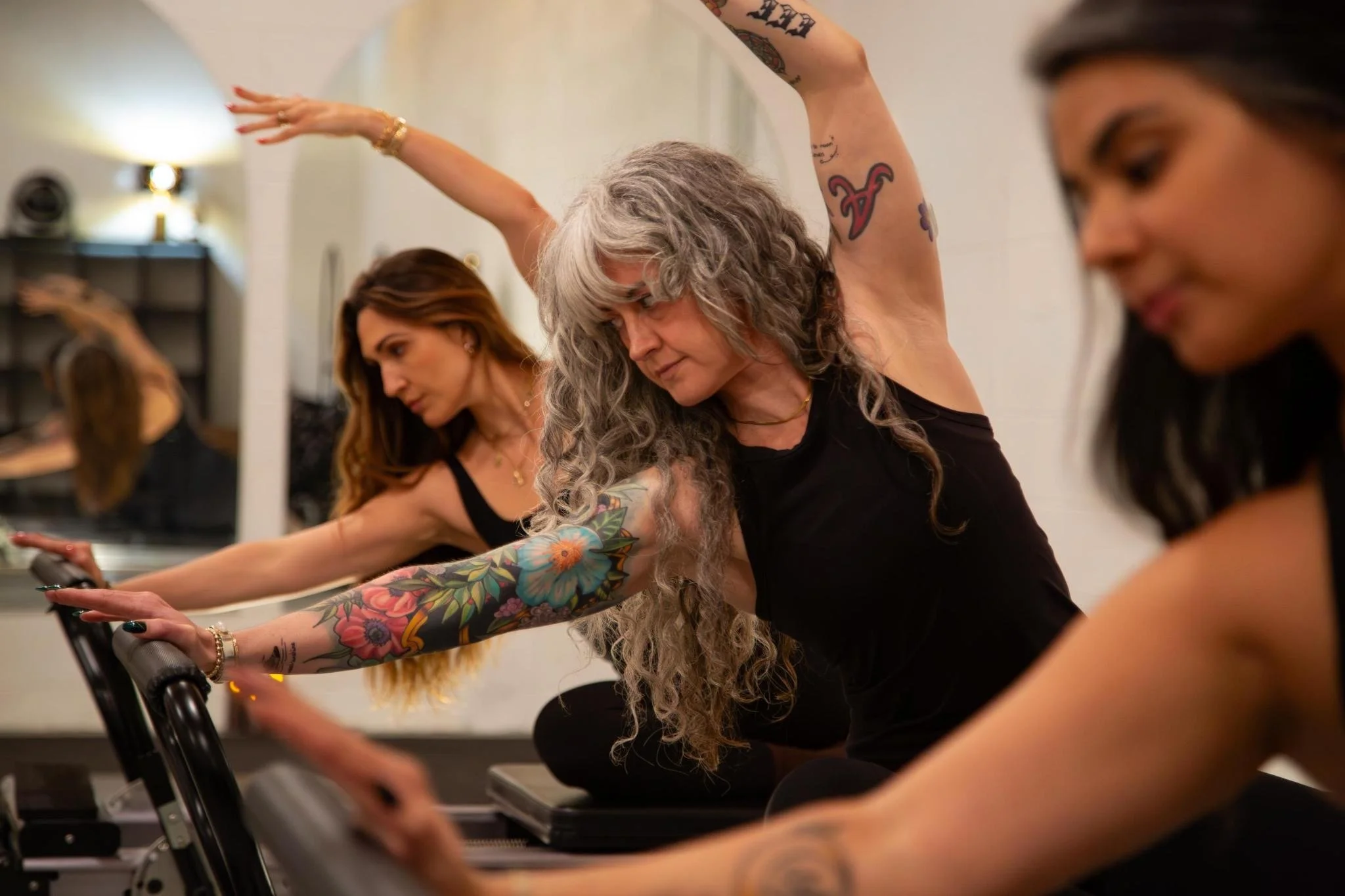 pilates small group class on the Reformer