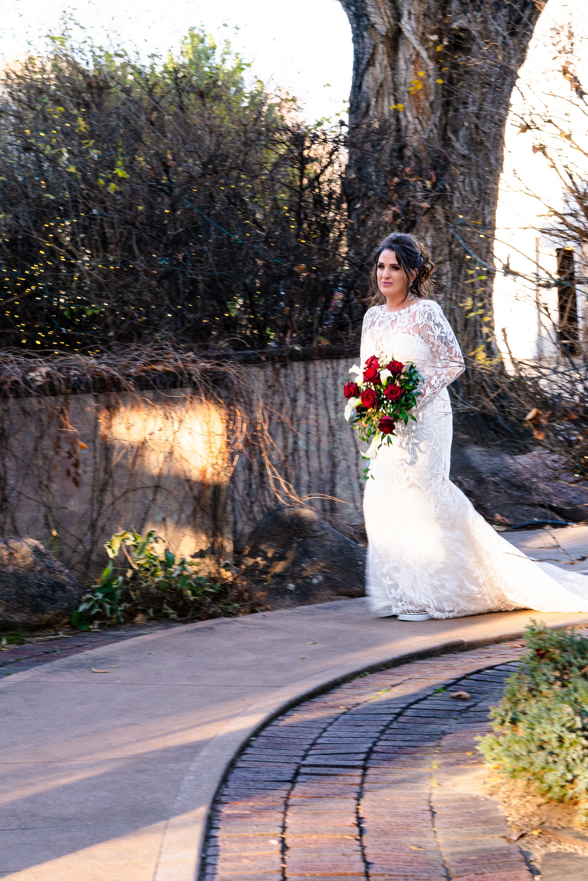 Bride walking down outdoor path