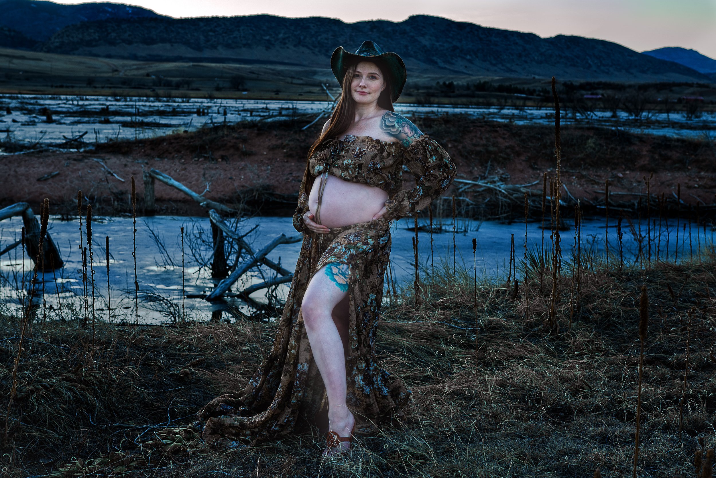 Beautiful rugged pregnant cowgirl