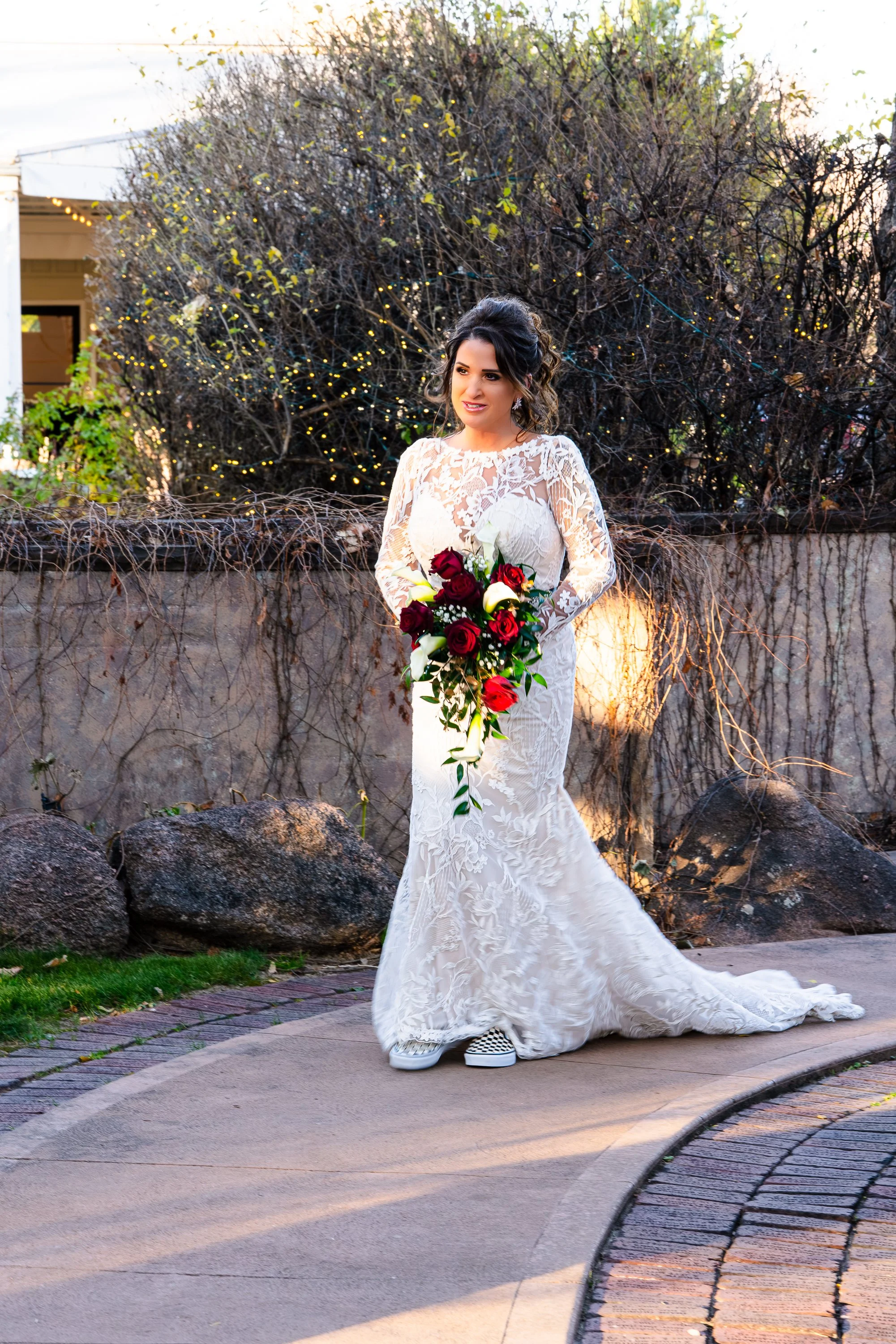Bride walking down outdoor path