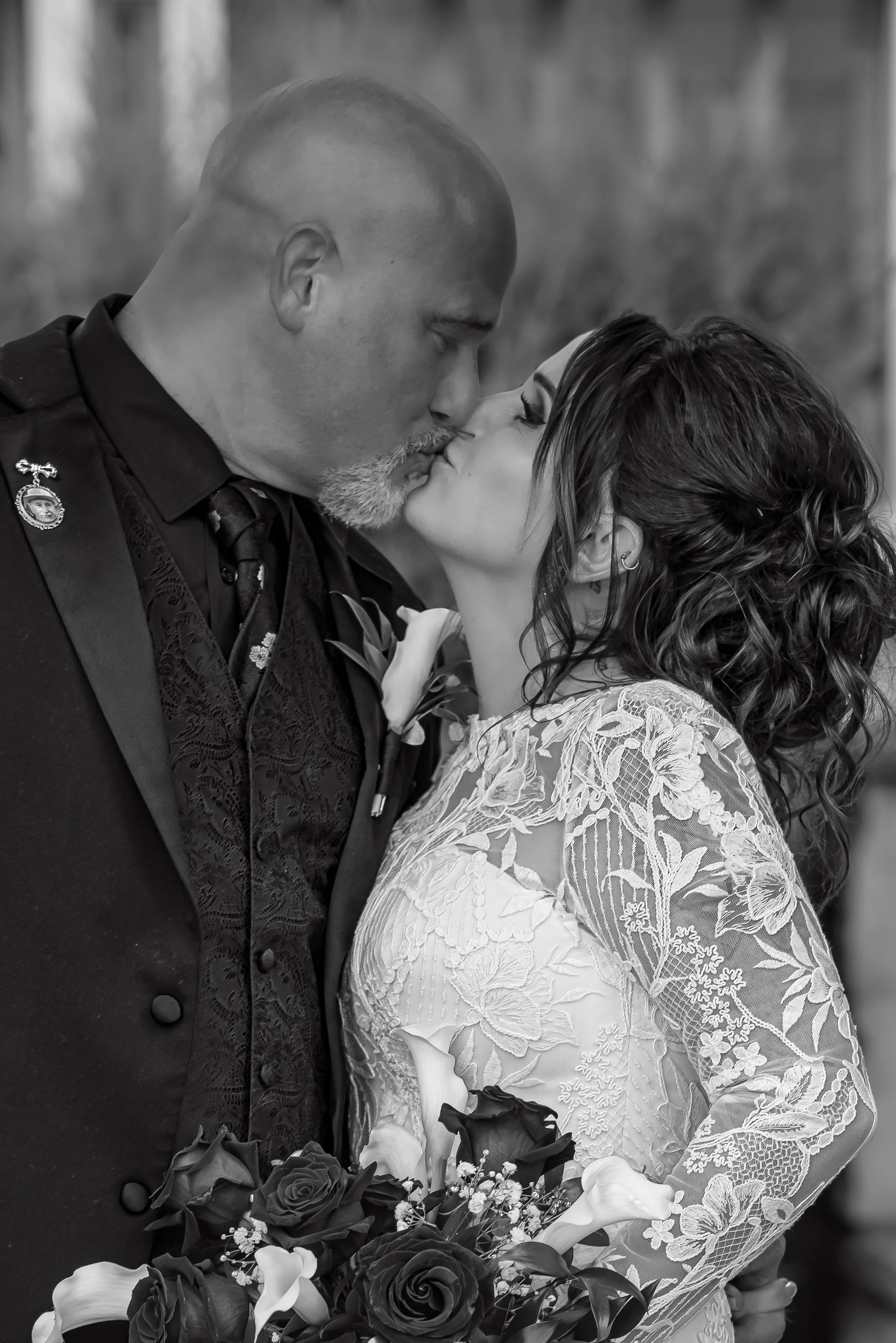 Black and white Bride and Groom kiss