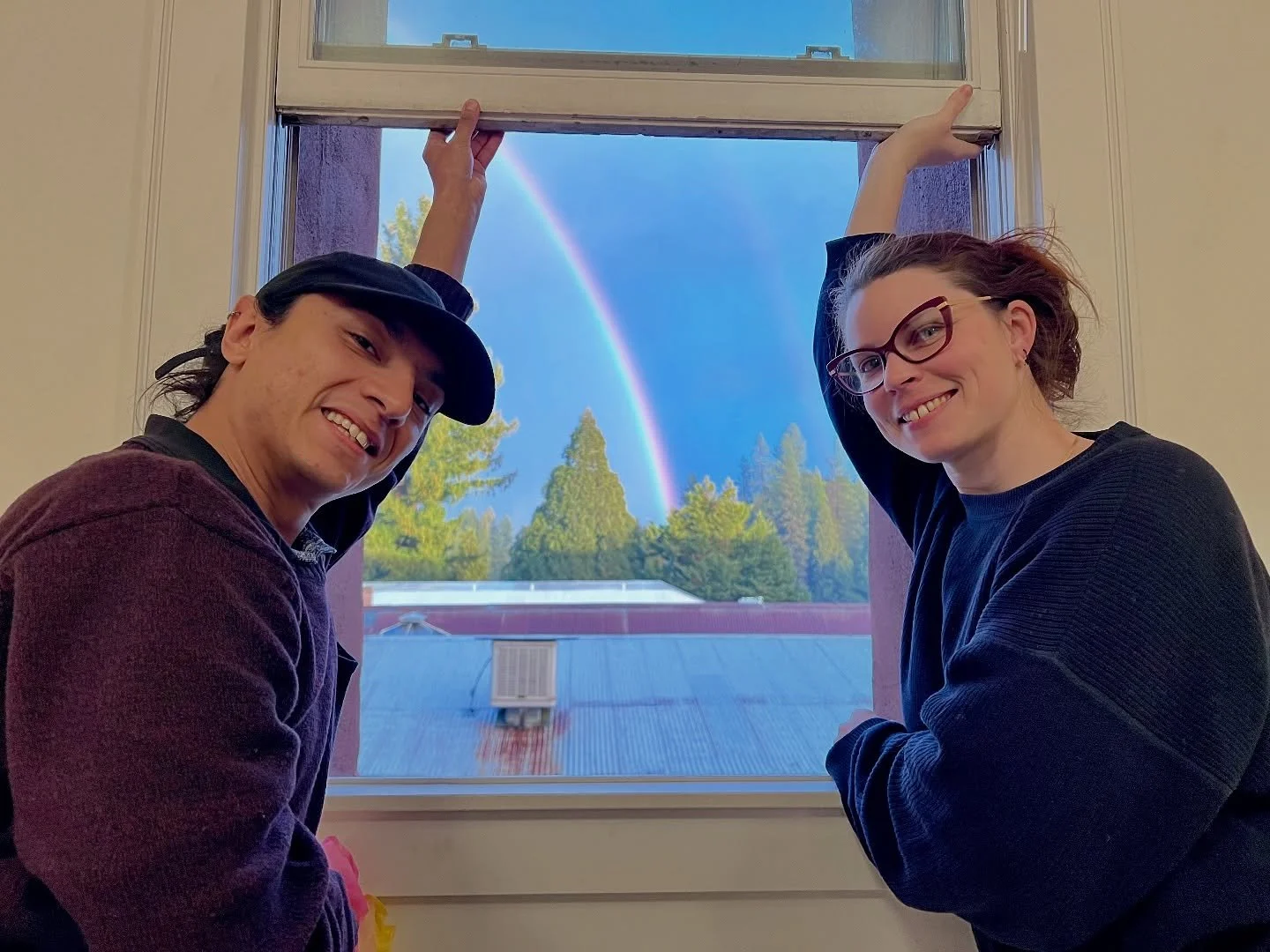 A beautiful rainbow 🌈 view from the office with Comms maven Michaelyn and our new intern Moises!