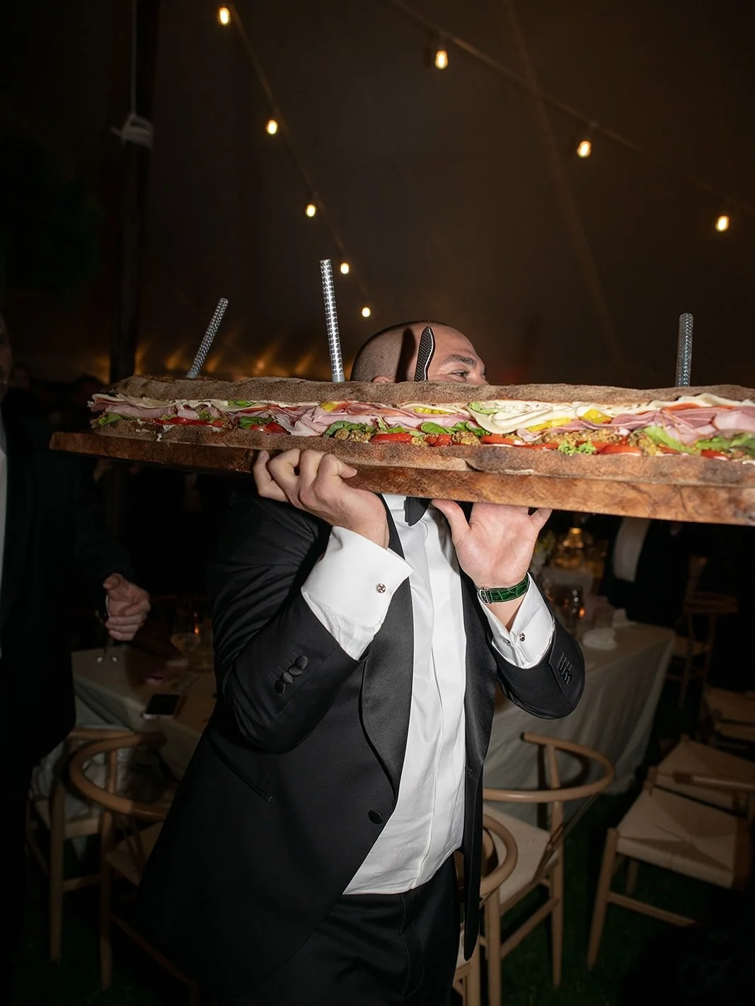 Instead of a traditional cake cutting, Sydney &amp; Louie opted for something that felt a little more personal. 

On one of our calls, Louie came up with the idea to have a &ldquo;breathtakingly large&rdquo; sub that would be served to guests as a la