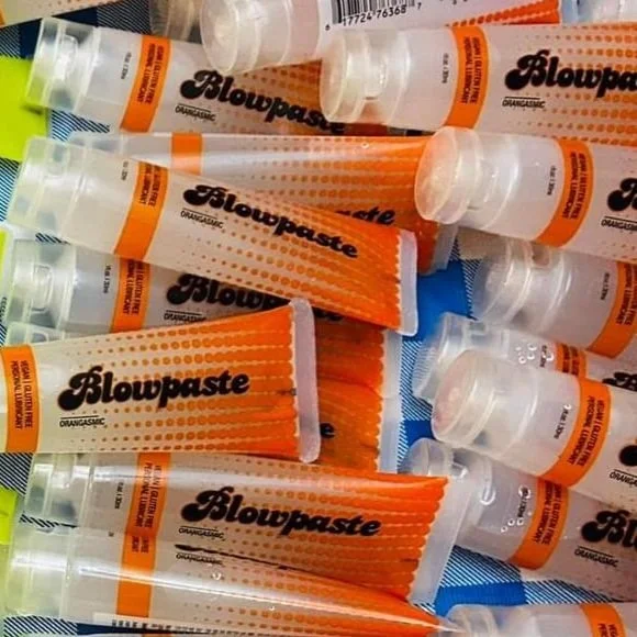 Blowpaste Orangasmic edible vegan orange flavored personal lubricant, a multitude of 1oz tubes ready to sell