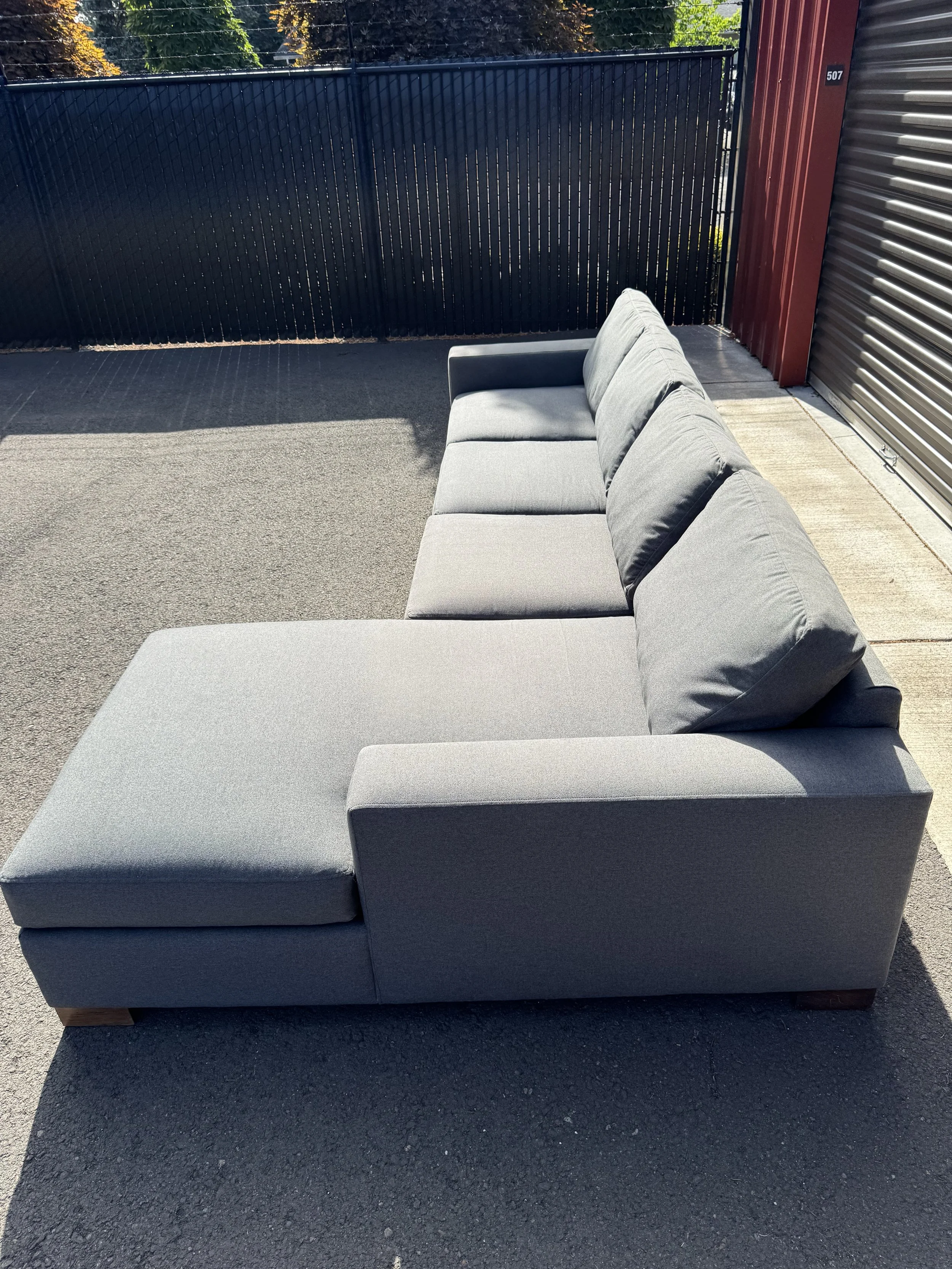 Paul Shatz Gray Sectional Couch $950(125"x67") seat Depth36" Height26"