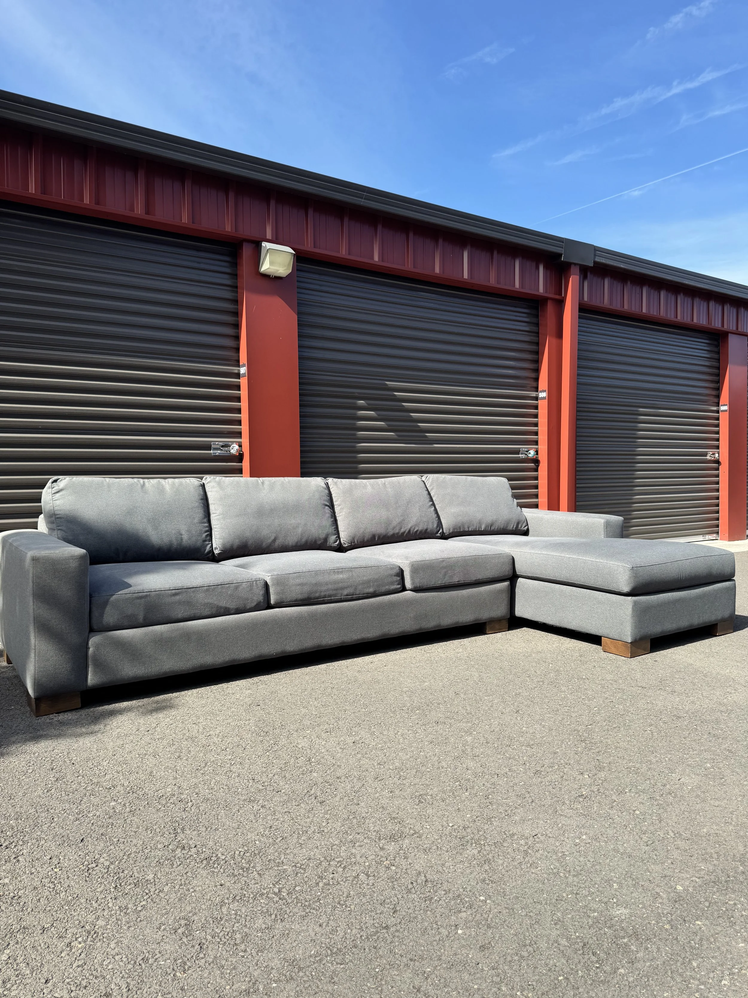 Paul Shatz Gray Sectional Couch $950(125"x67") seat Depth36" Height26"