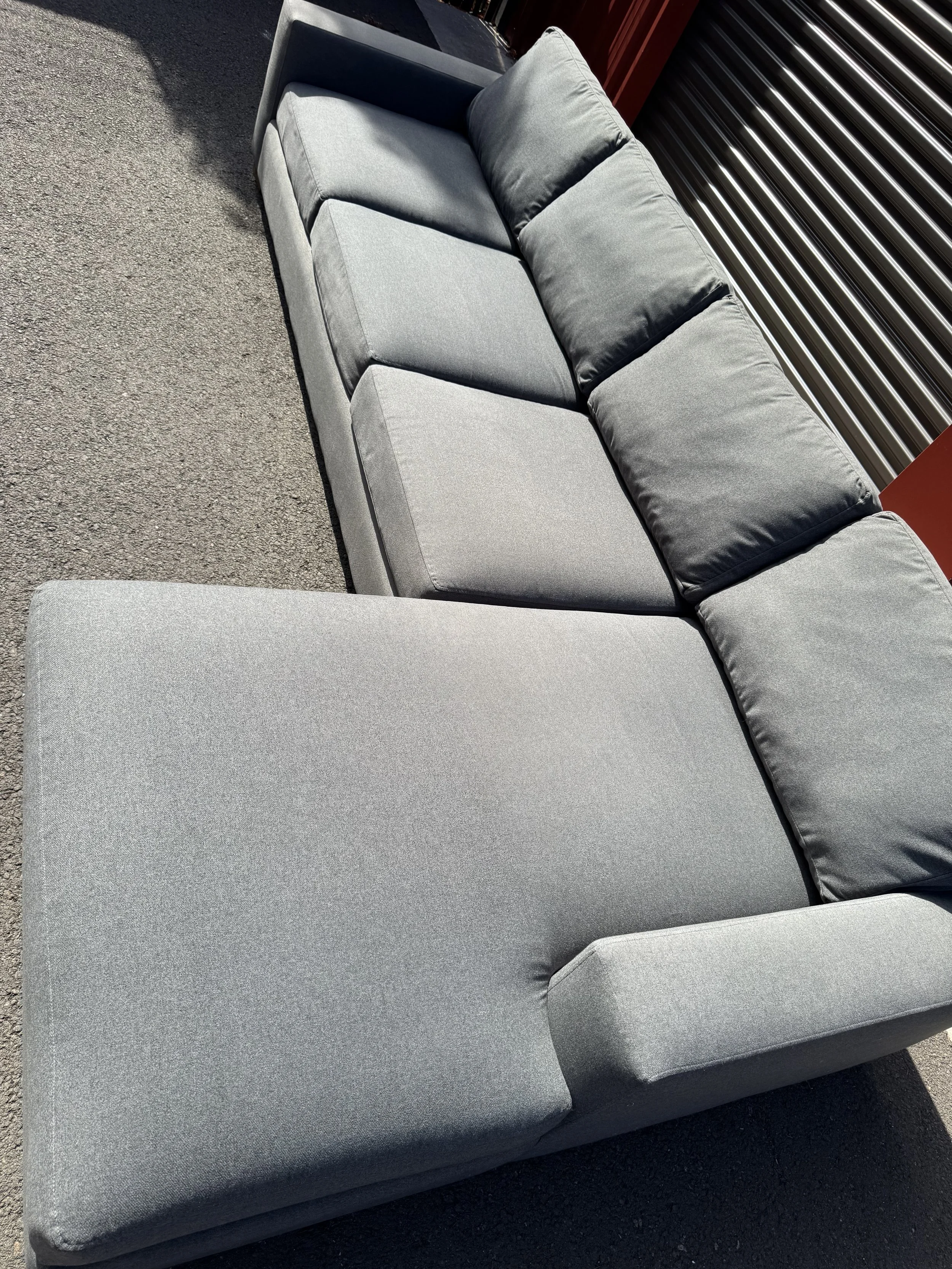 Paul Shatz Gray Sectional Couch $950(125"x67") seat Depth36" Height26"