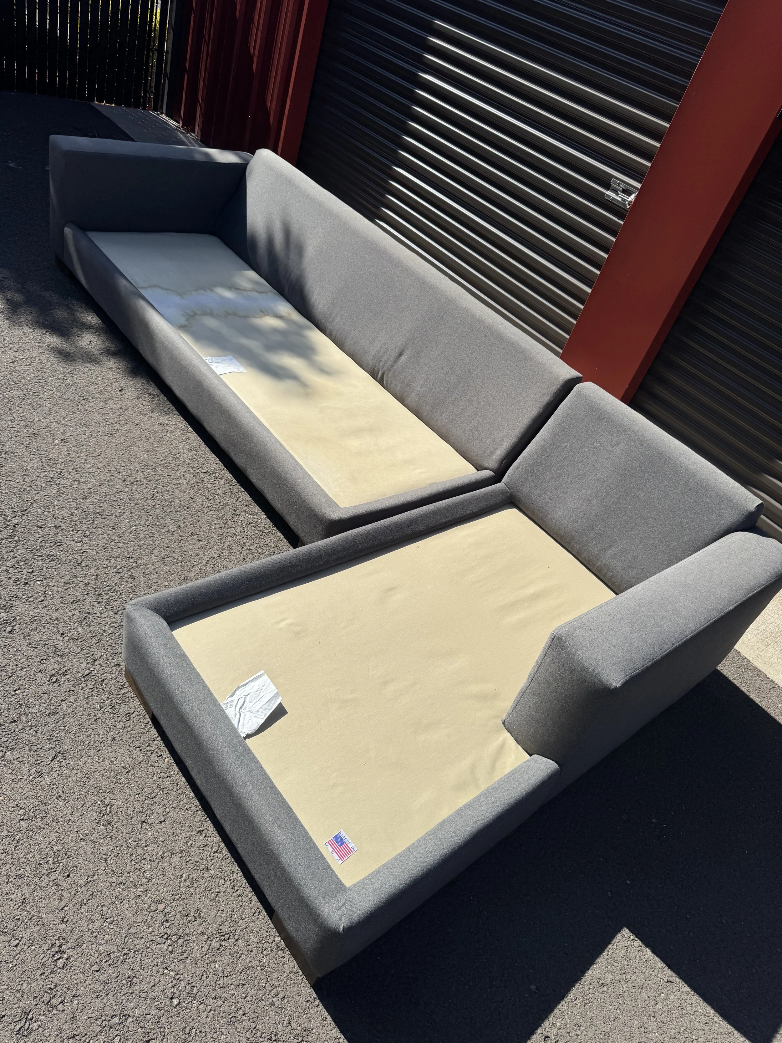 Paul Shatz Gray Sectional Couch $950(125"x67") seat Depth36" Height26"