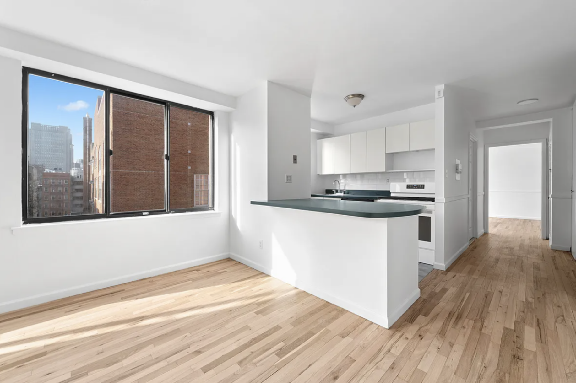 Grand St & Baxter St- 1BR/1BA