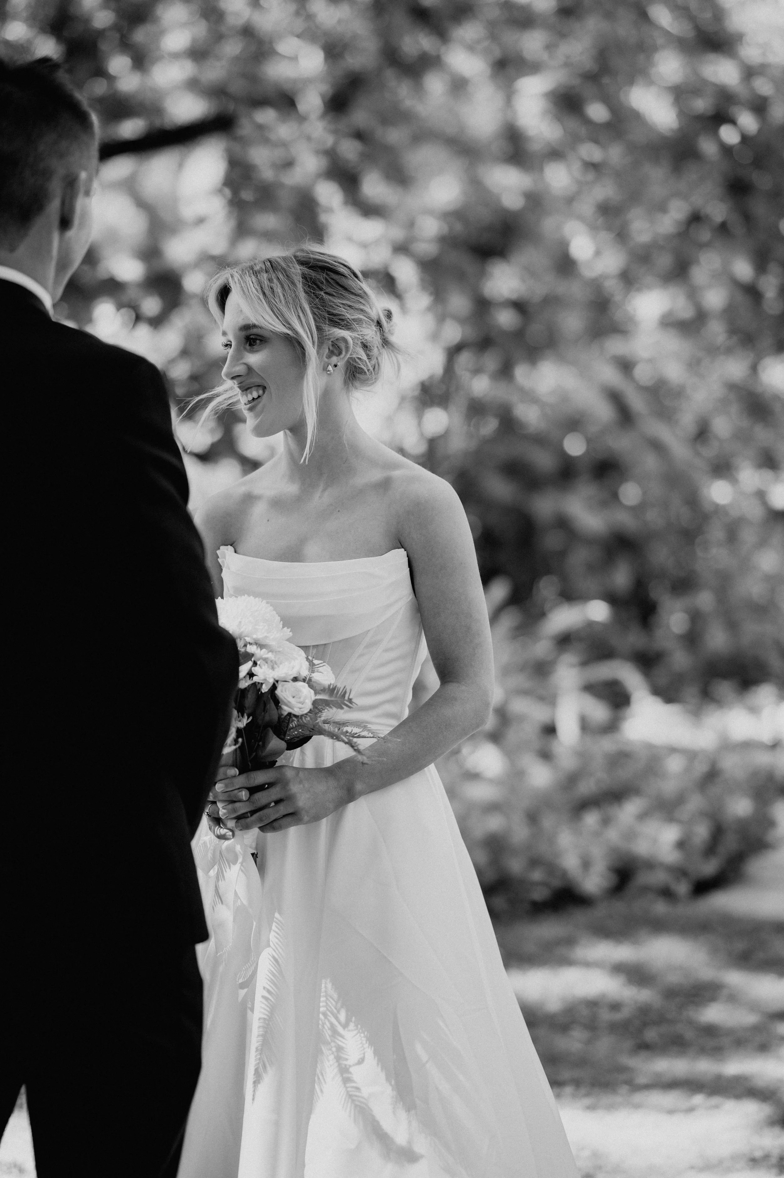 Bride smiling at her groom during an elopement ceremony in Adelaide
