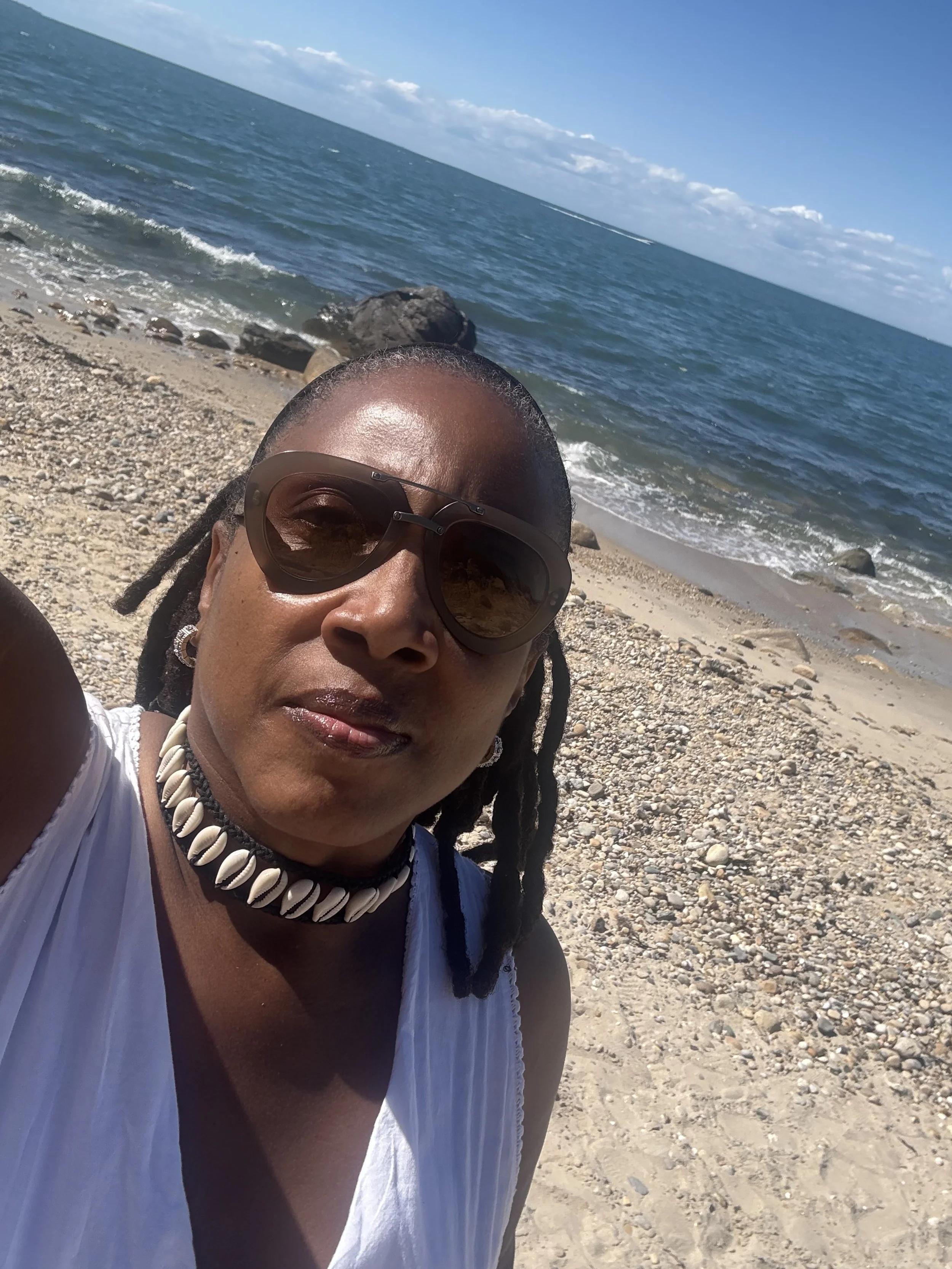 darlene on the beach paying homage to the ancestors