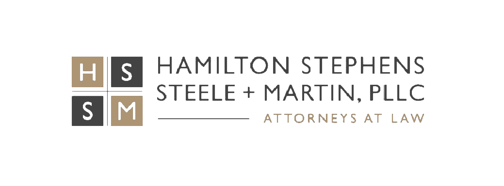 Law firm logo for Hamilton Stephens Steele & Martin, PLLC with an emblem featuring overlapping gray and beige squares with initials H, S, and M, and text indicating attorneys at law.
