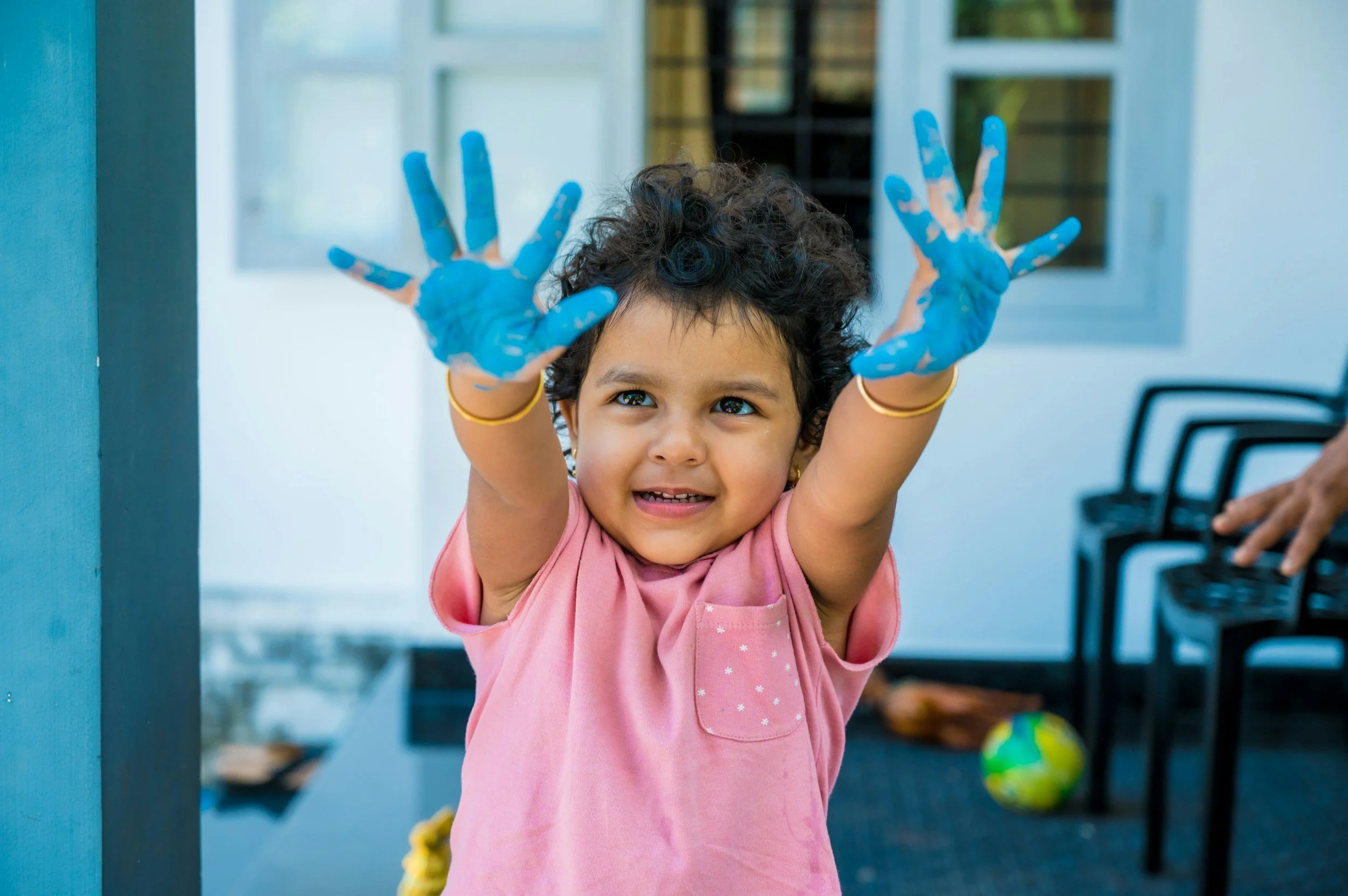 Speech therapy session with child painting in Albuquerque New Mexico