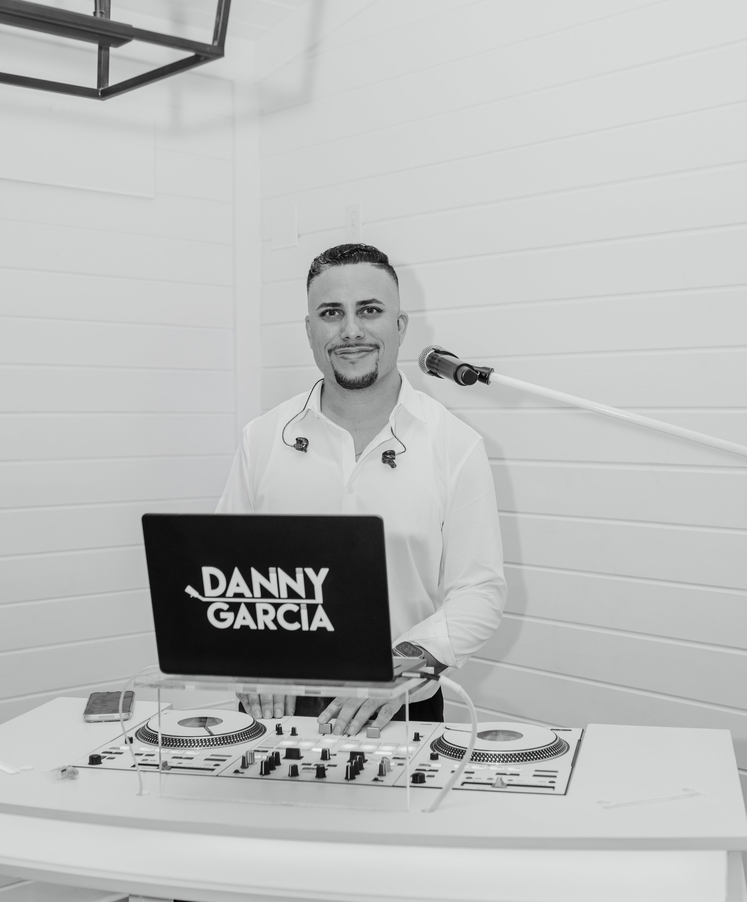 DJ Danny Garcia at his professional DJ setup ready to perform at an Orlando wedding or event