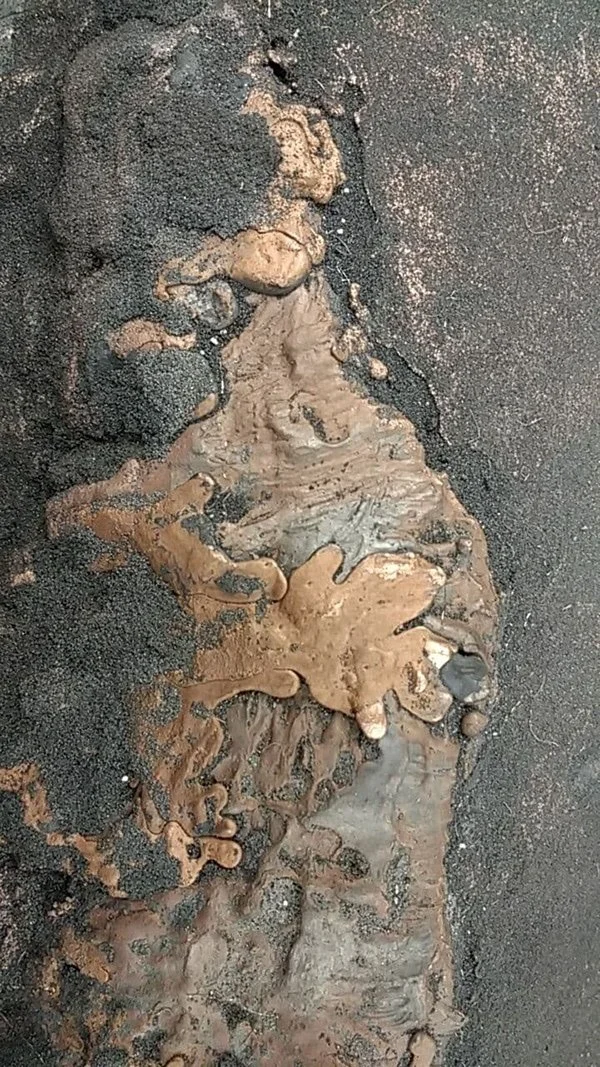 Close up of copper melt patterns. 