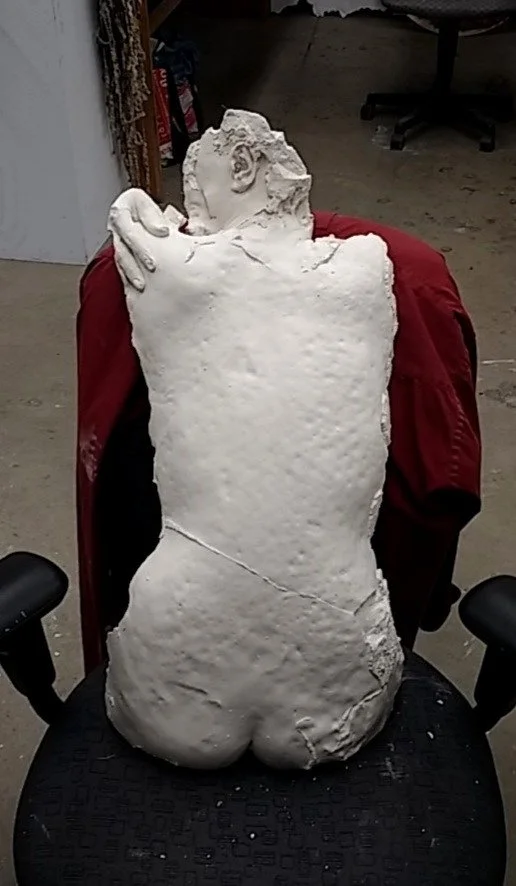 Life casting taken from subject then cast in plaster.