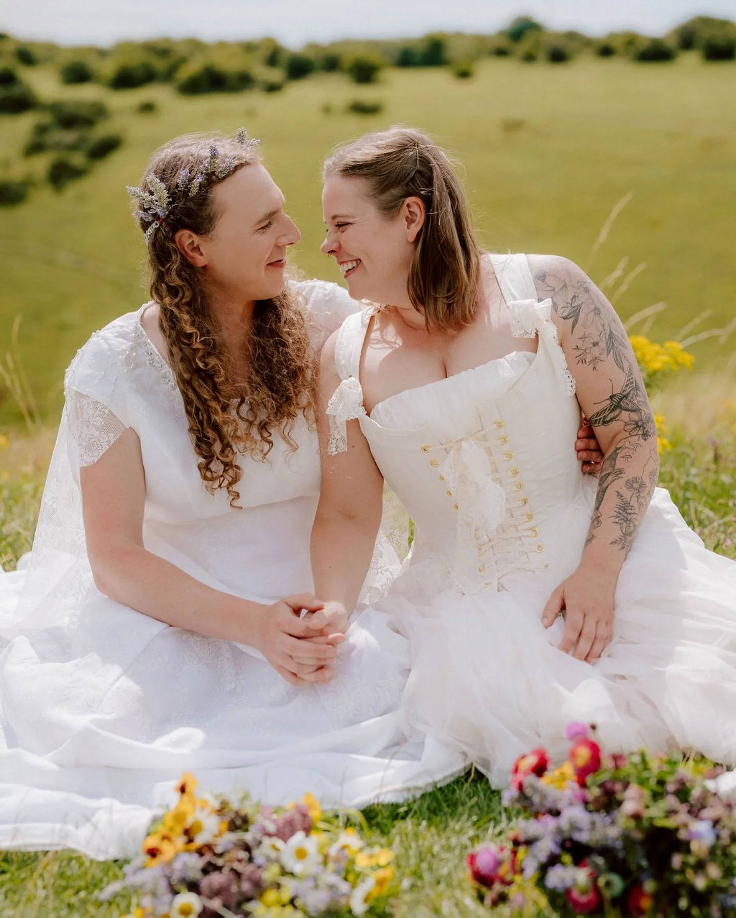In times of hate, we look for hope. 

I am looking back to this beautiful sunny day in August, where we gathered under a tree and celebrated the ten year anniversary of Elle (she/her) and Myra (she/her) with a vow renewal ceremony. 

Weddings are not