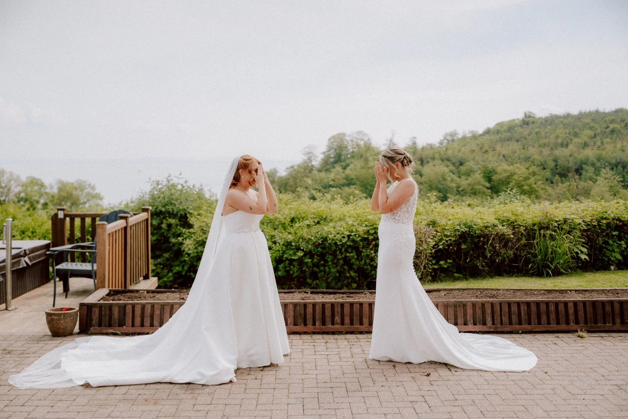 Two brides having a first look in Pembrokeshire