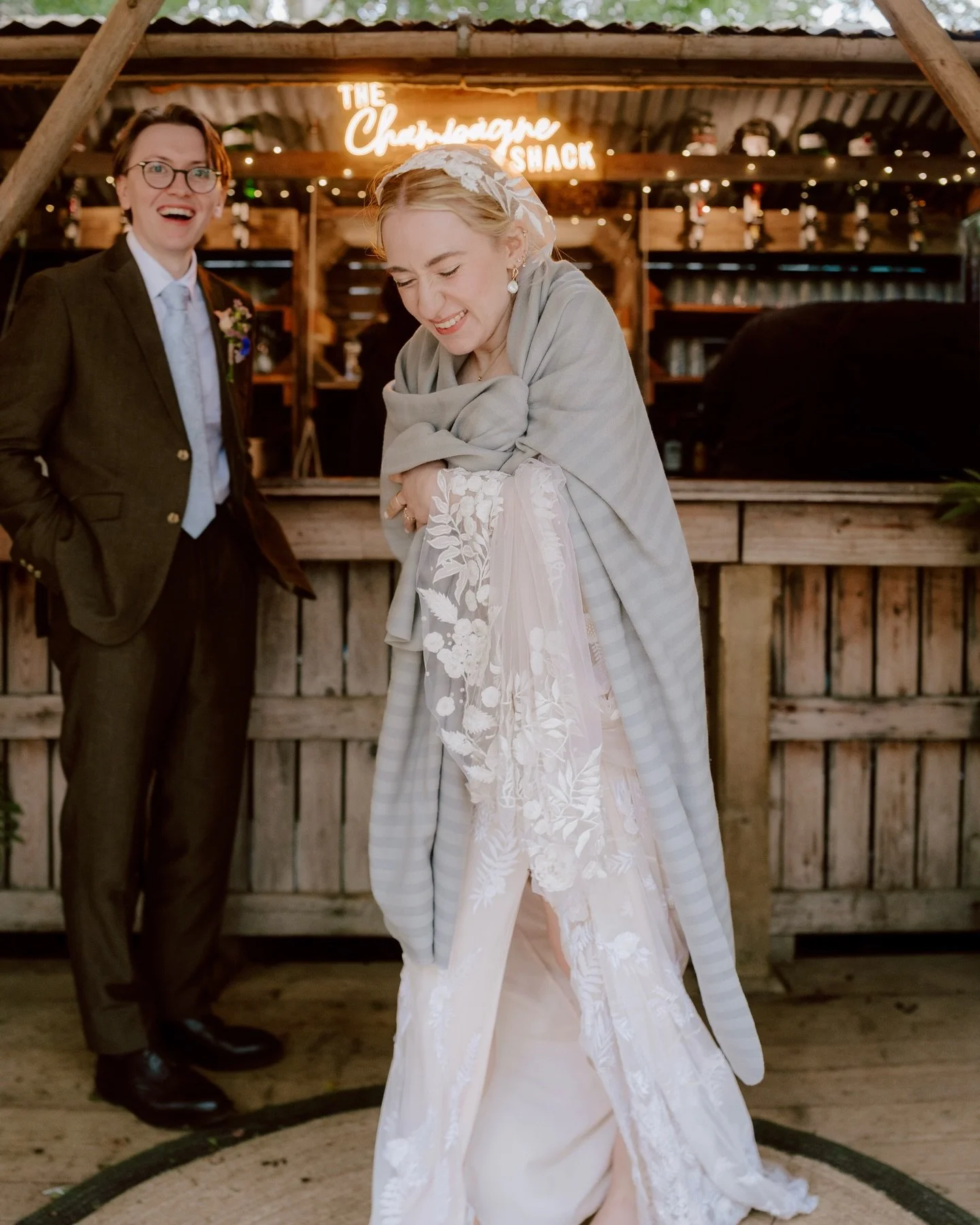 I love rain at weddings. 

I always recommend that when hunting for your photographer you have seen their work in all sorts of conditions. Truly, just about anyone can make great light and expensive set ups look good. After eleven years of this gig, 