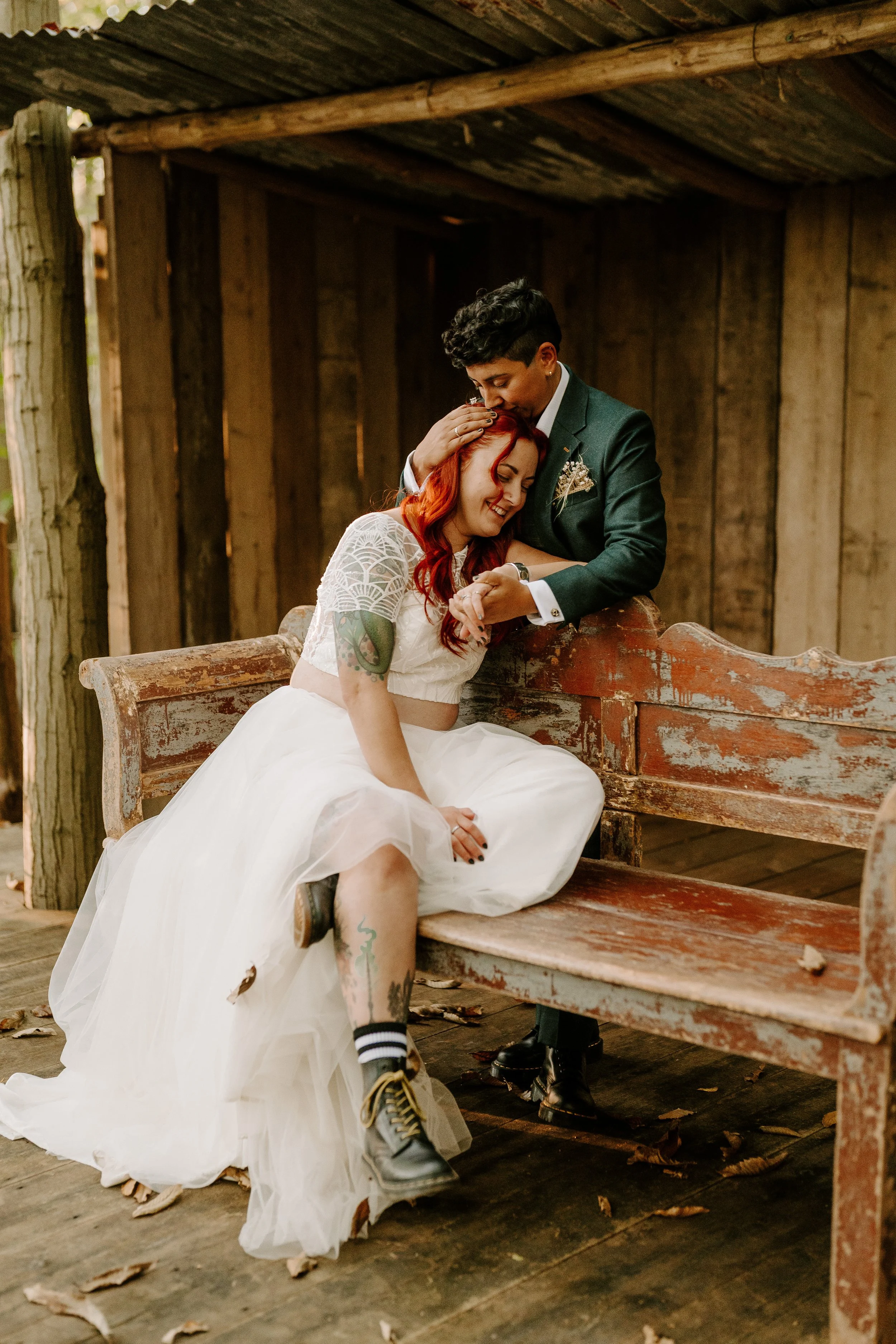 LGBTQIA+ couple wearing dr martens on their wedding day in october