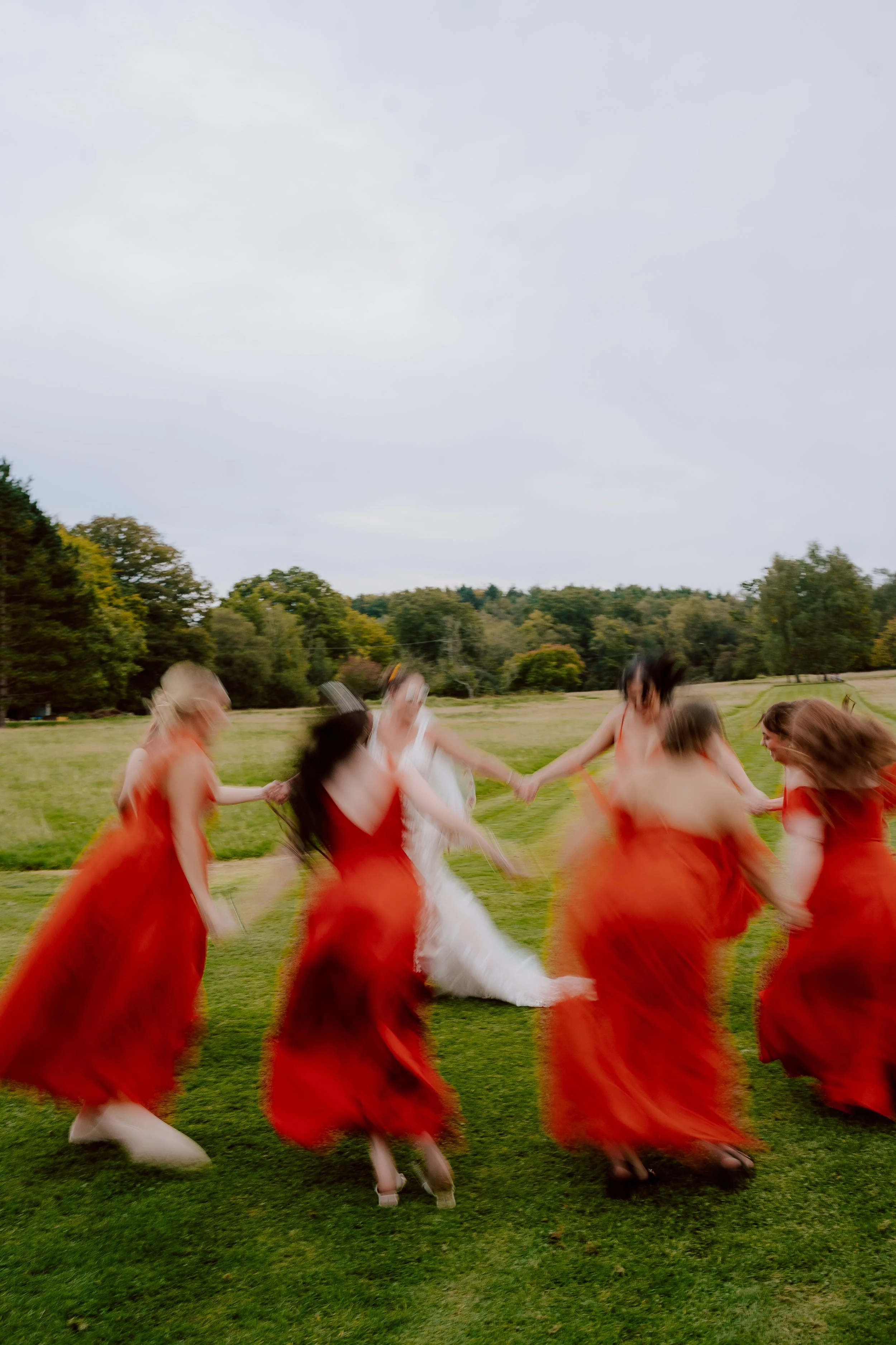 bridesmaidsdancinginfieldoctoberwedding