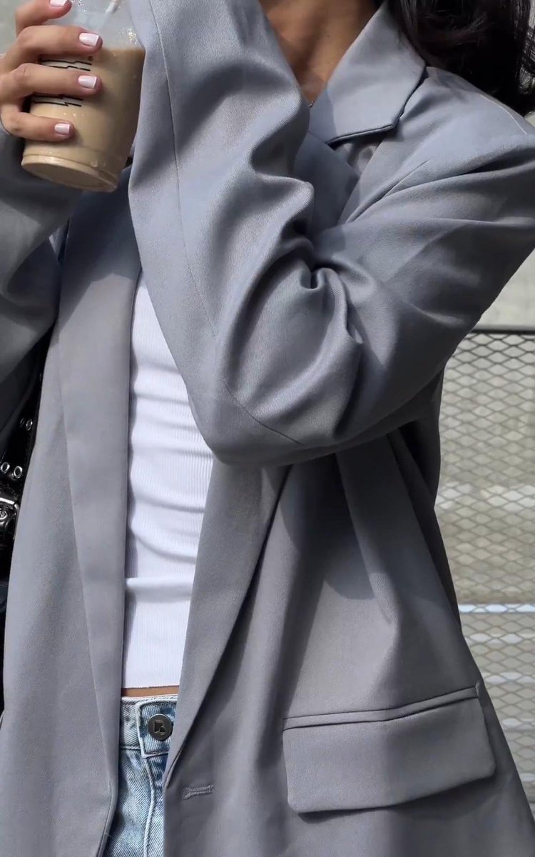 Close-up of a tailored grey blazer