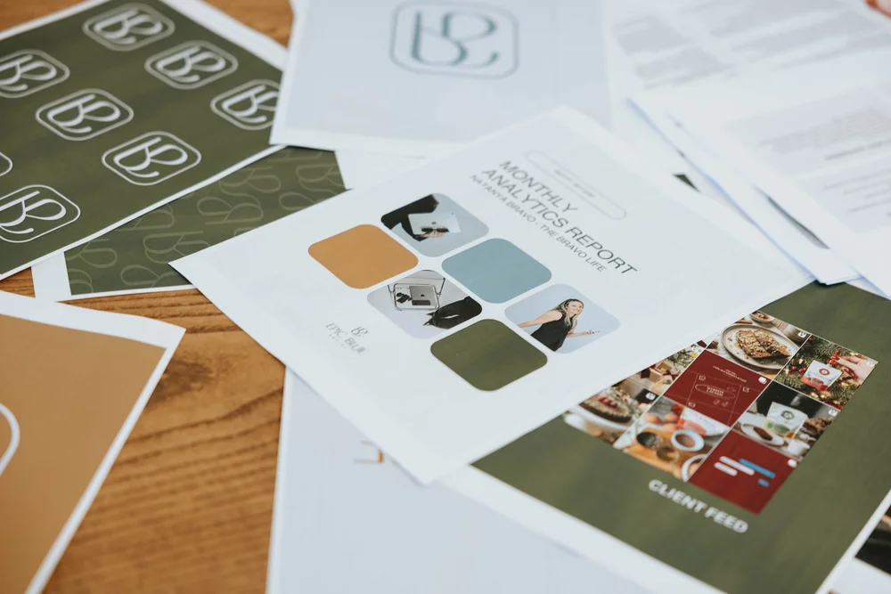 Printed brand and content planning sheets on a desk