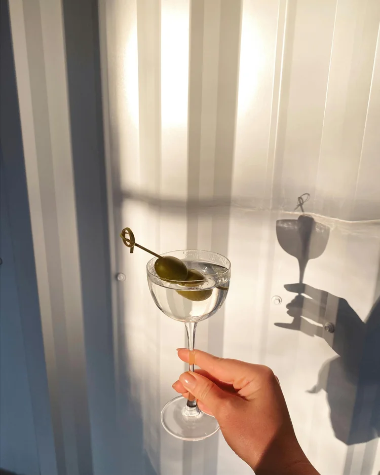 Glass casting a soft shadow in morning light