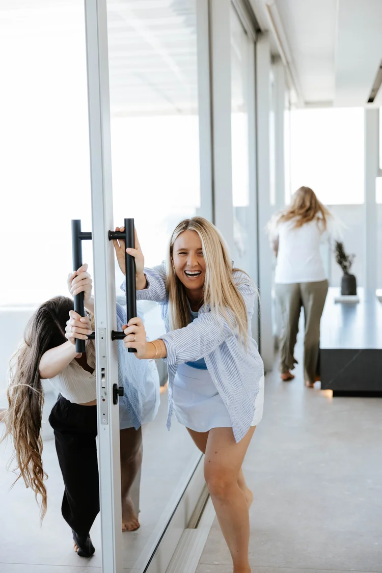 The team laughing together in the office