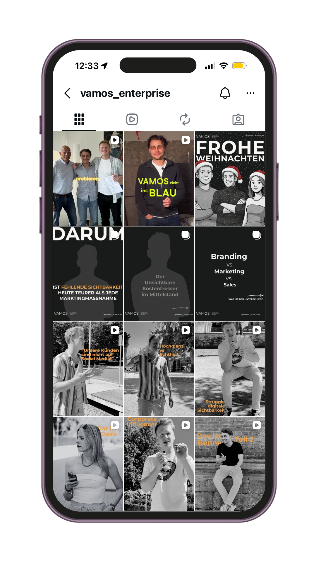 Screenshot eines Instagram-Profils namens 'vamos_enterprise' mit verschiedenen Beiträgen, darunter Gruppenfotos, Porträts, Textgrafiken und Videothumbnails, die Themen wie Marketing, Branding und Social Media behandeln.