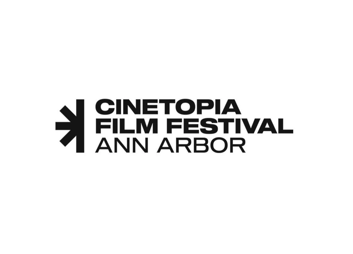 The Cinetopia Film Festival logo, featuring half an asterisk, split down the middle, and the words, in bold font, "Cinetopia Film Festival", and in normal font, "Ann Arbor"