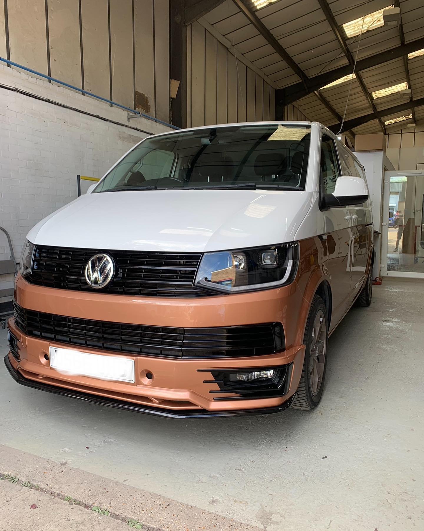 VW T6 Transporter lower half colour change in VW Copper Bronze, grills and rear spoiler into gloss black, new headlights rear lights and front splitters fitted 🤩 

Now off for full camper conversion 👌

#vw #vwt6 #vwcamper #camper #custom #customvan