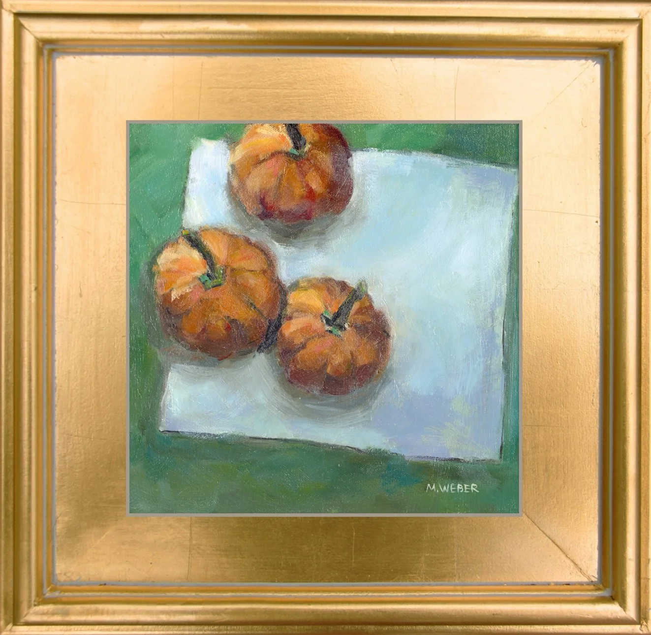 Original oil painting of three pumpkins on white cloth with green background by Merrill Weber
