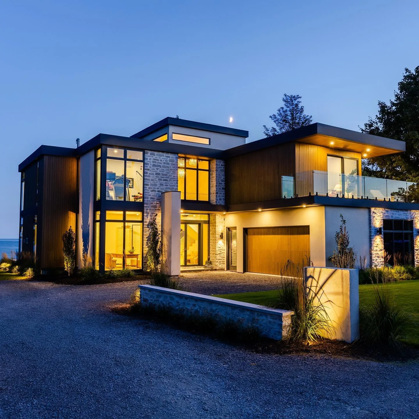 Our Landscape Lighting design &amp; install lit up this project perfectly 💡🪴 From the moment you approach the driveway you are welcomed by uplights, garden lights, path lights, inset shoreline wall lights, step lighting  and exterior sconces - all 