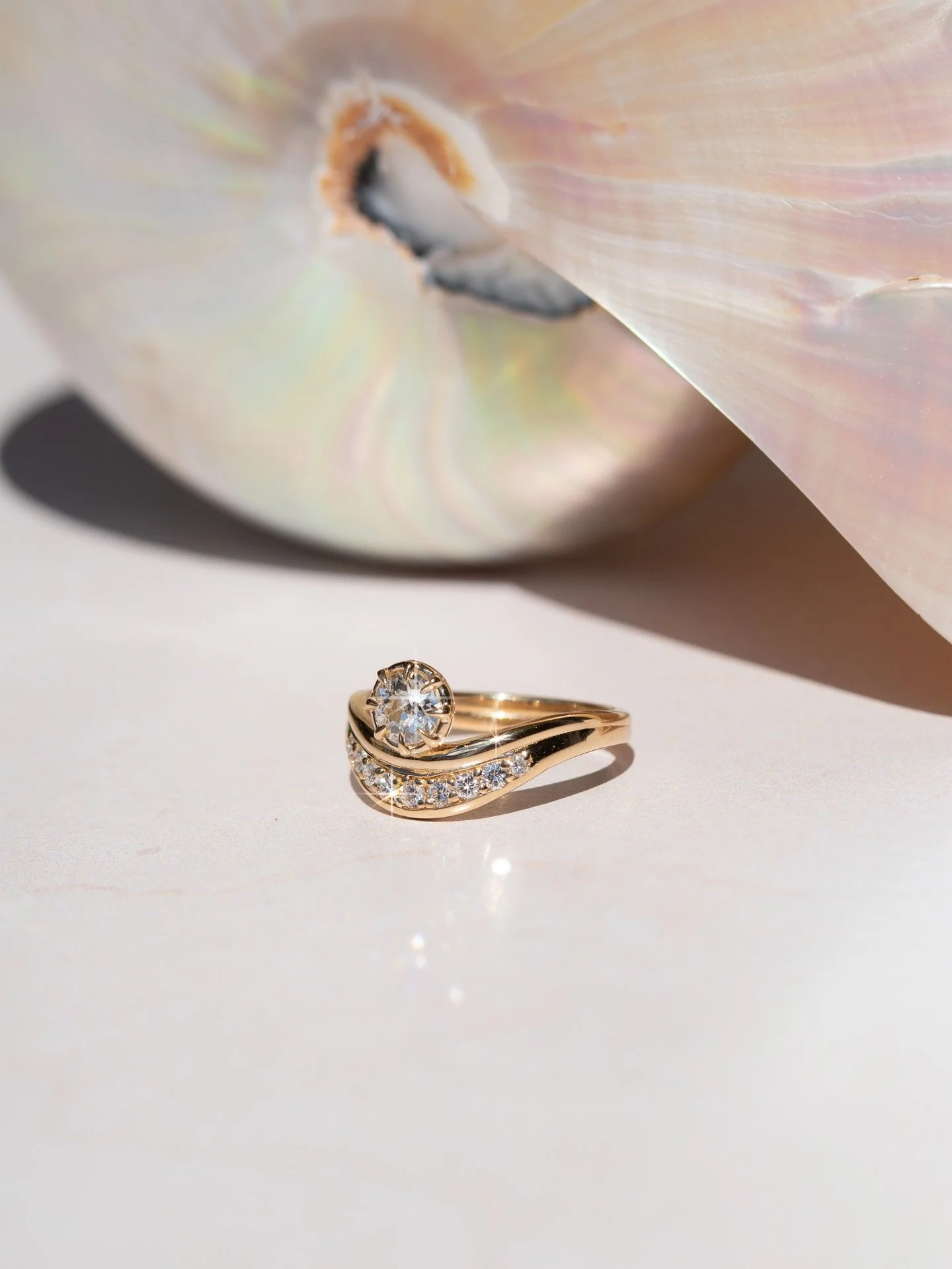 Every Mari custom begins with a story. ✨
 This ring was crafted from a cherished heirloom &mdash; reimagined with a modern silhouette that curves and flows like the ocean that inspired it.
 From sketches to CAD to final polish, every detail was consi