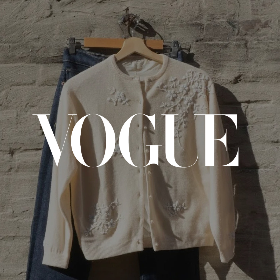 Vogue feature graphic showing a BLK Ivy cardigan displayed on a hanger