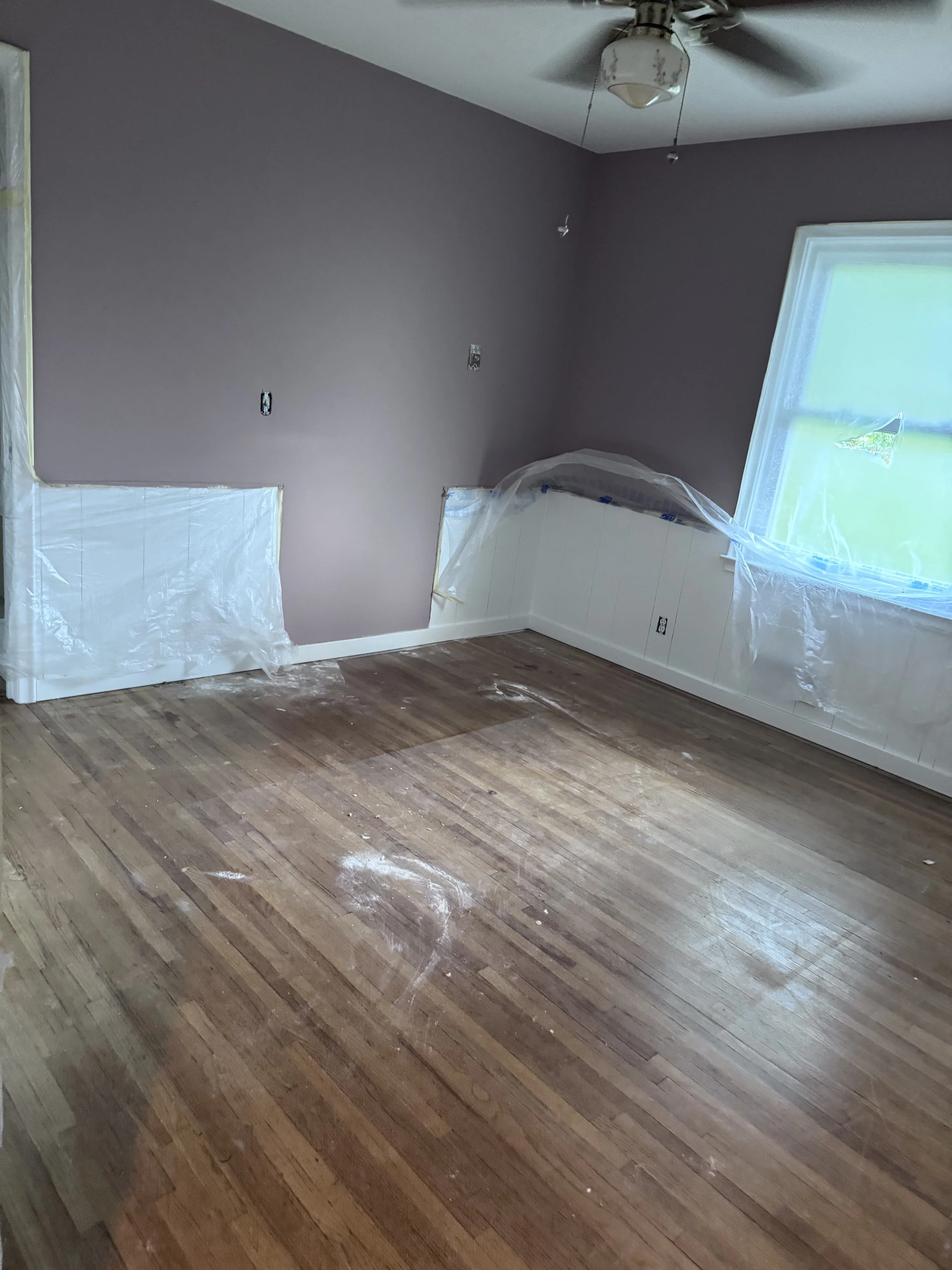 office bedroom view worn floors.jpeg