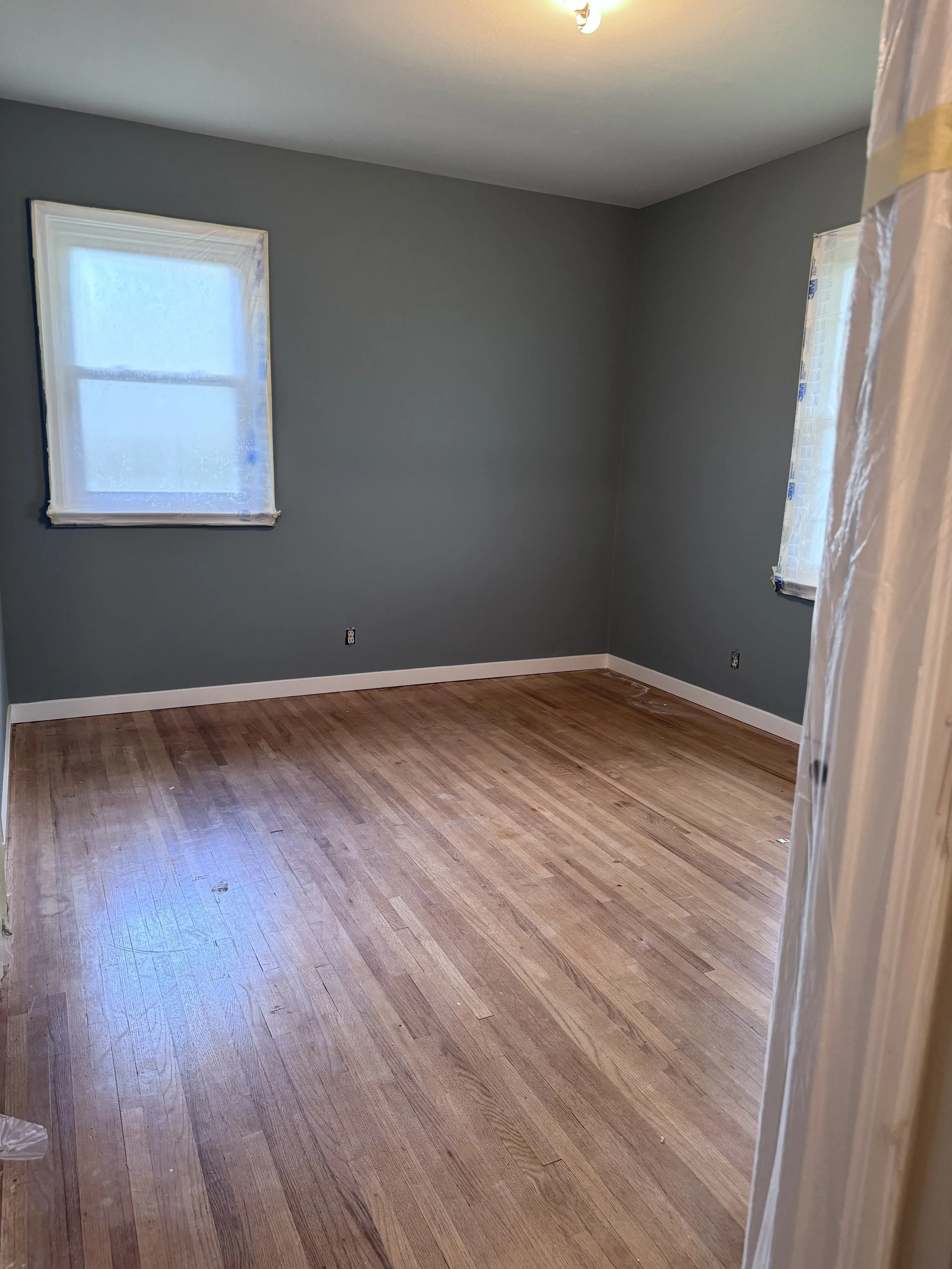 bedroom view worn floors.jpeg