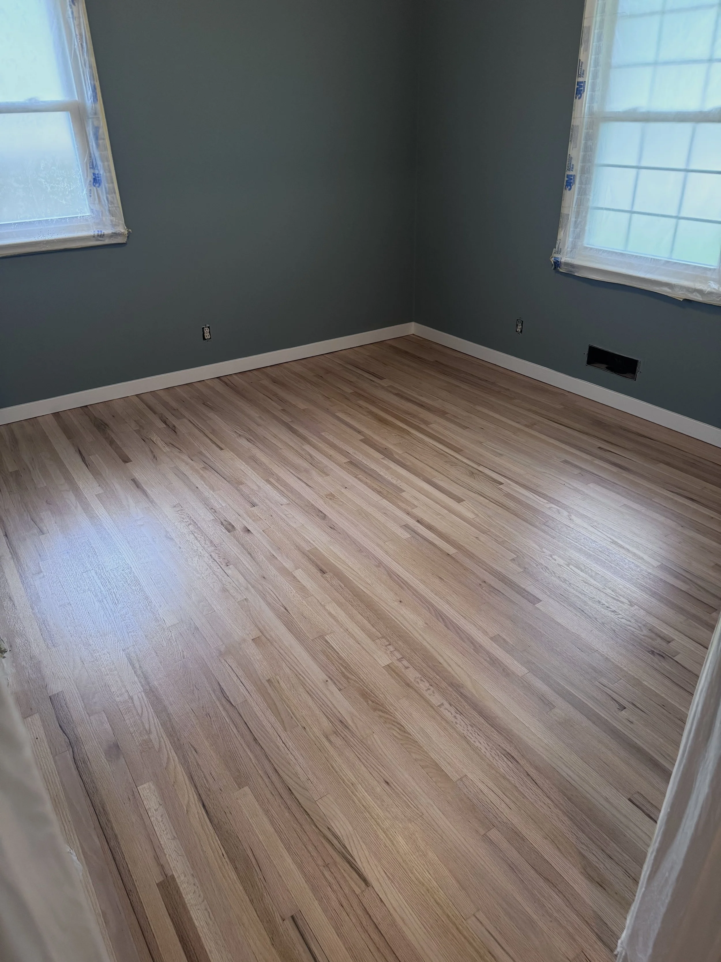refinished bedroom floor.jpeg