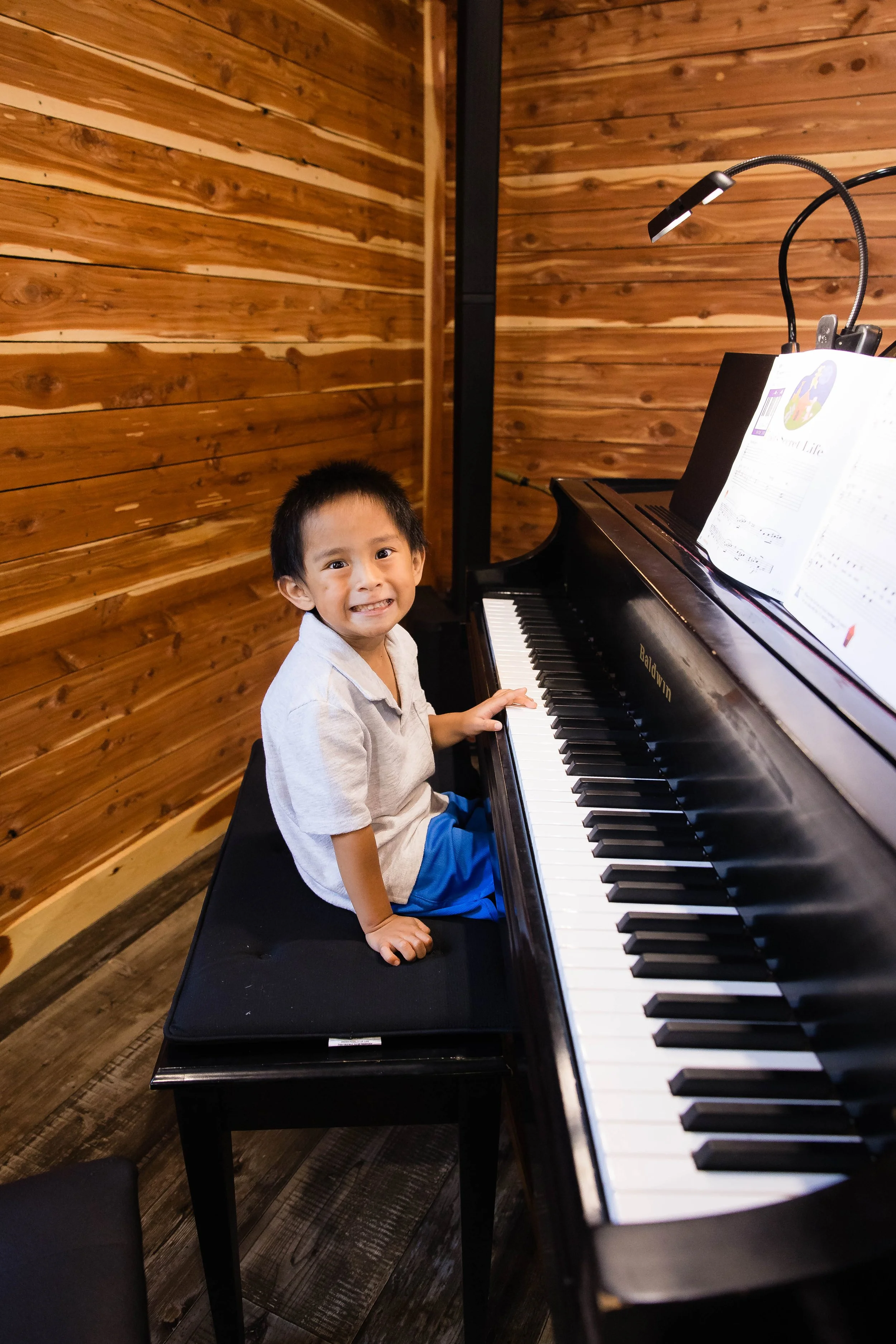 young student at piano