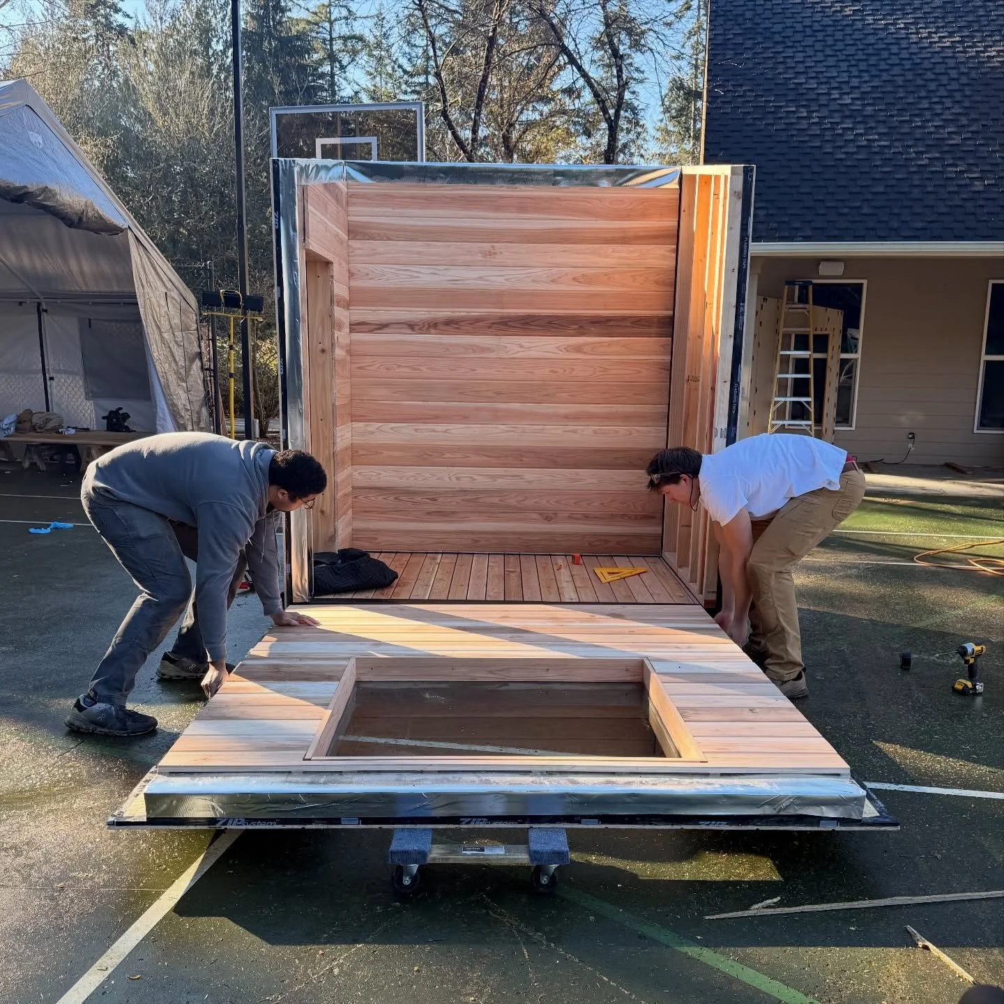 This is where it all comes together! When building my modular saunas I assemble them for the first time at my shop. I align all the pieces and drill pilot holes and lags once everything is square and flush.  After that I do my paint, trim work, and r
