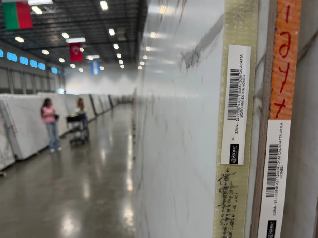 Rows of natural stone slabs at a slab yard — Ever After Interiors, Casper, Wyoming