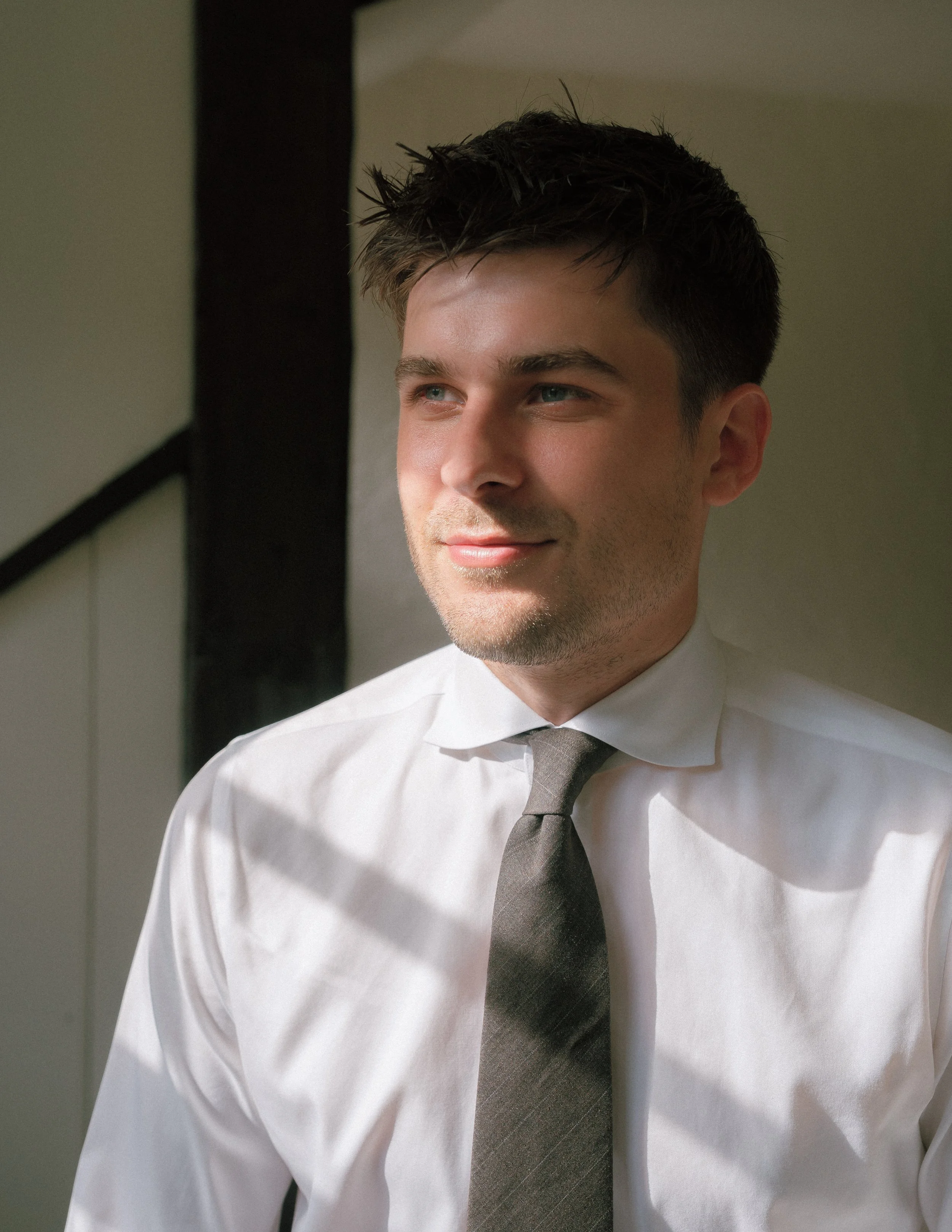 A groom's portrait in color digital photography at Troutbeck in Amenia, New York