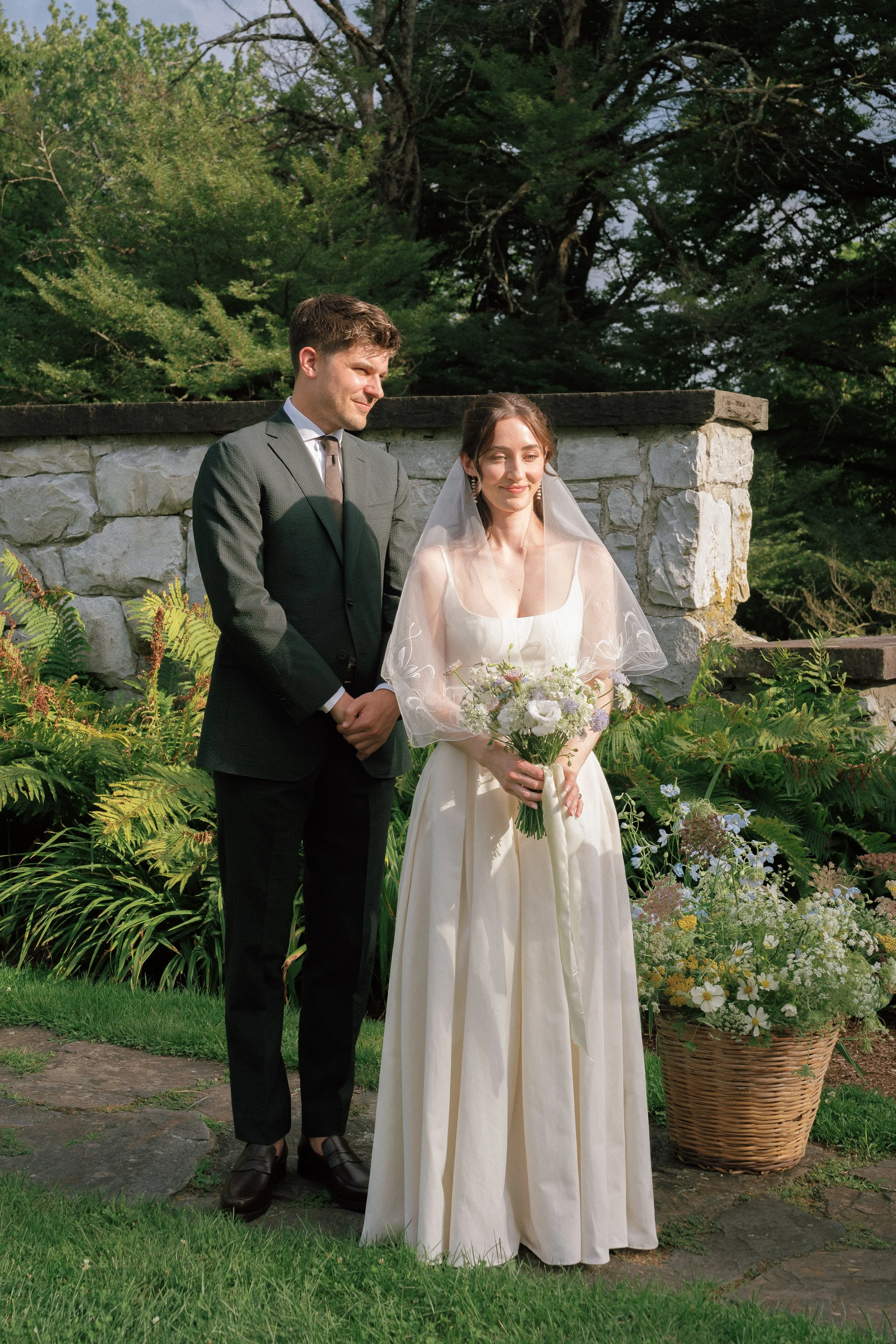 A couple at their wedding ceremony in color digital photography, getting married at Troutbeck in Amenia, New York