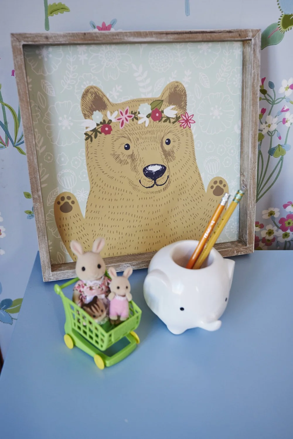 Photo by: Steven Dewall
A tiny shopping cart takes the bunnies for a ride, while the whimsical elephant cup keeps pencils close at hand. 